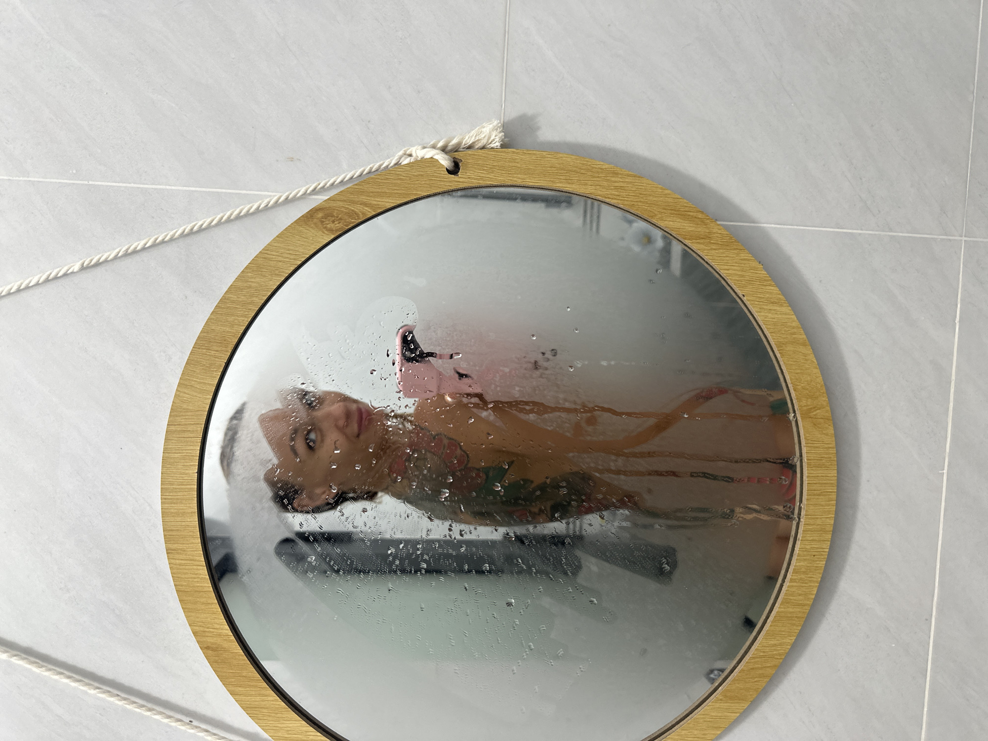 Person documents bathroom selfies in steamy mirror, Mũi Né