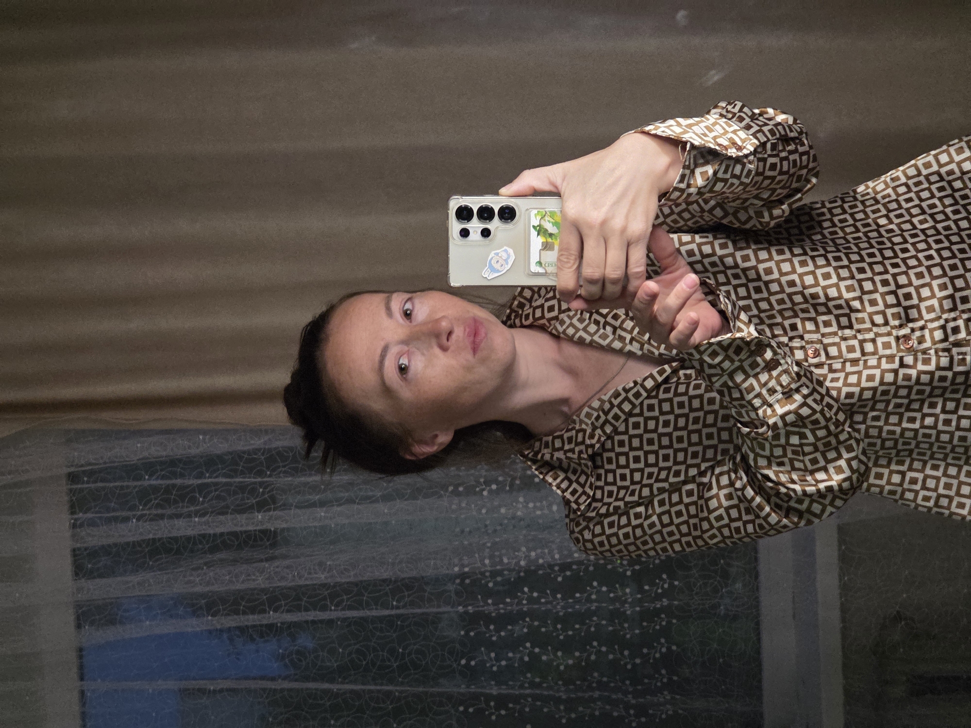 Evening in: satin sheets, an art book, and selfies