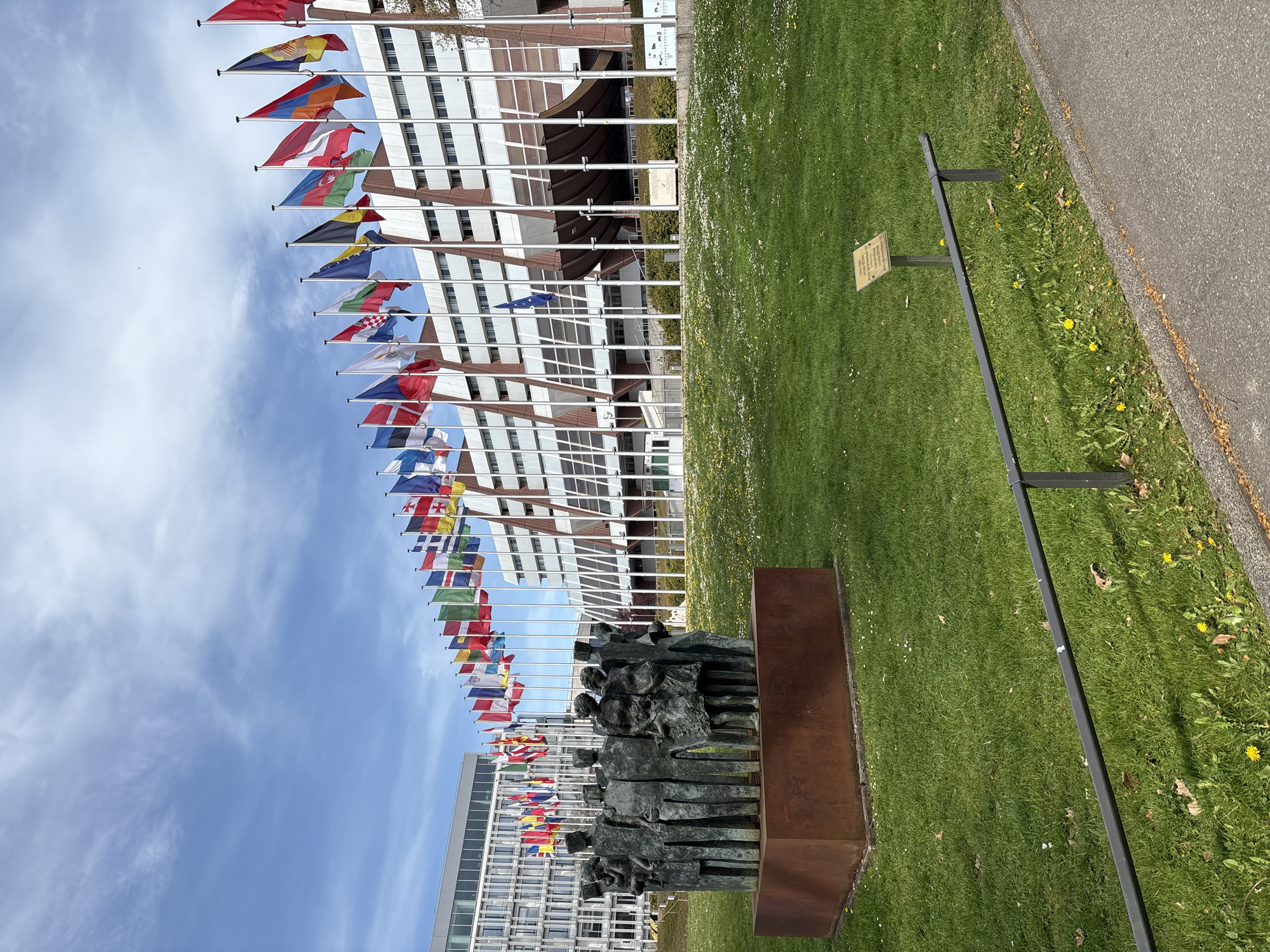 Council of Europe building observed in Strasbourg with member flags