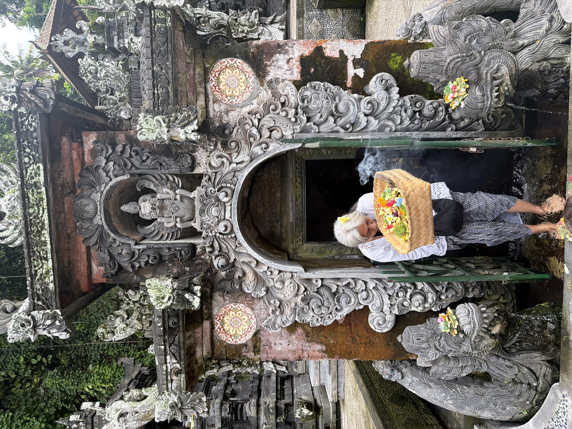 Religious ceremonies and tourism observed at Bali water temples