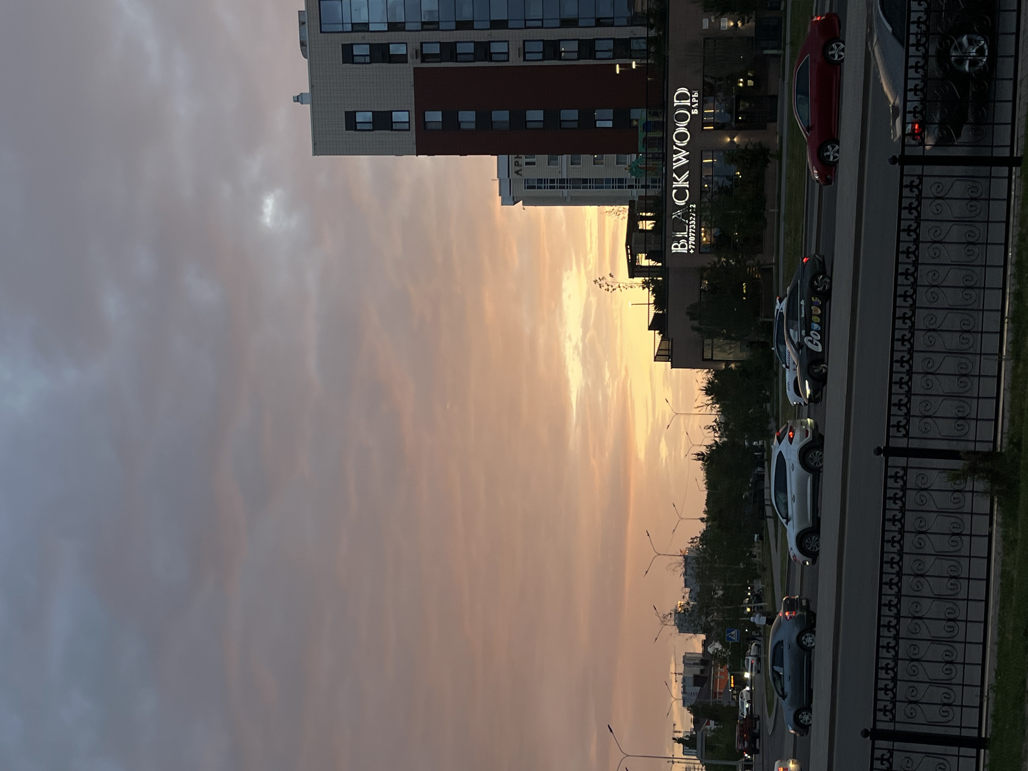 Evening street scene captured in Astana with sunset glow