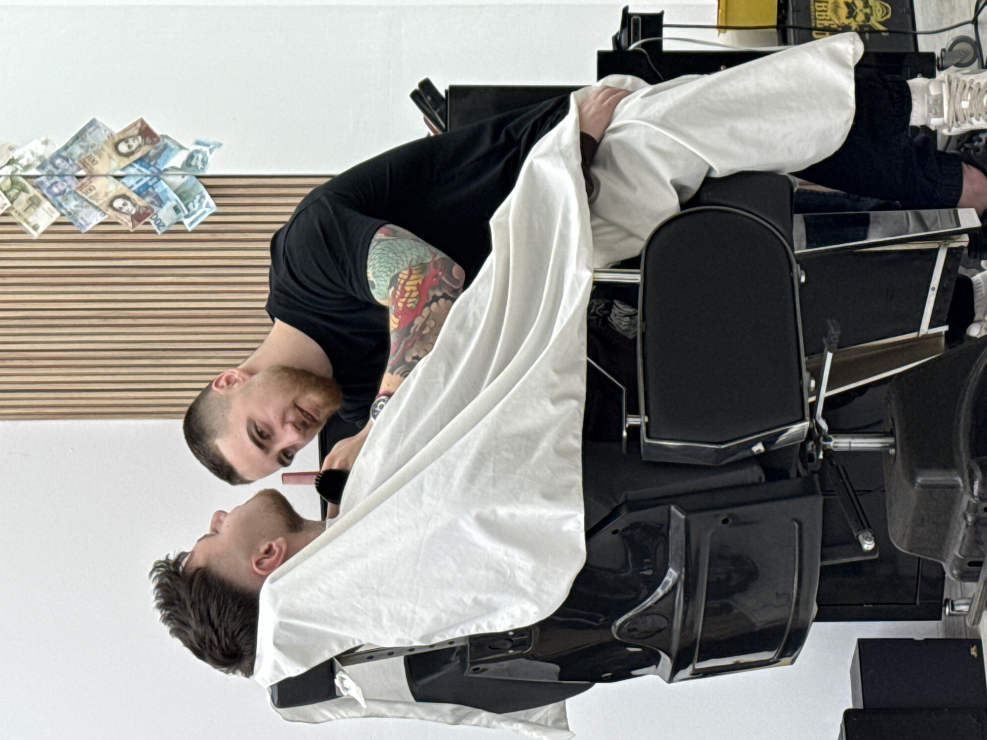Barber provides haircut and shave services in Sofia