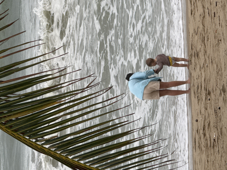 Overcast morning beach activity observed in Nha Trang, Vietnam