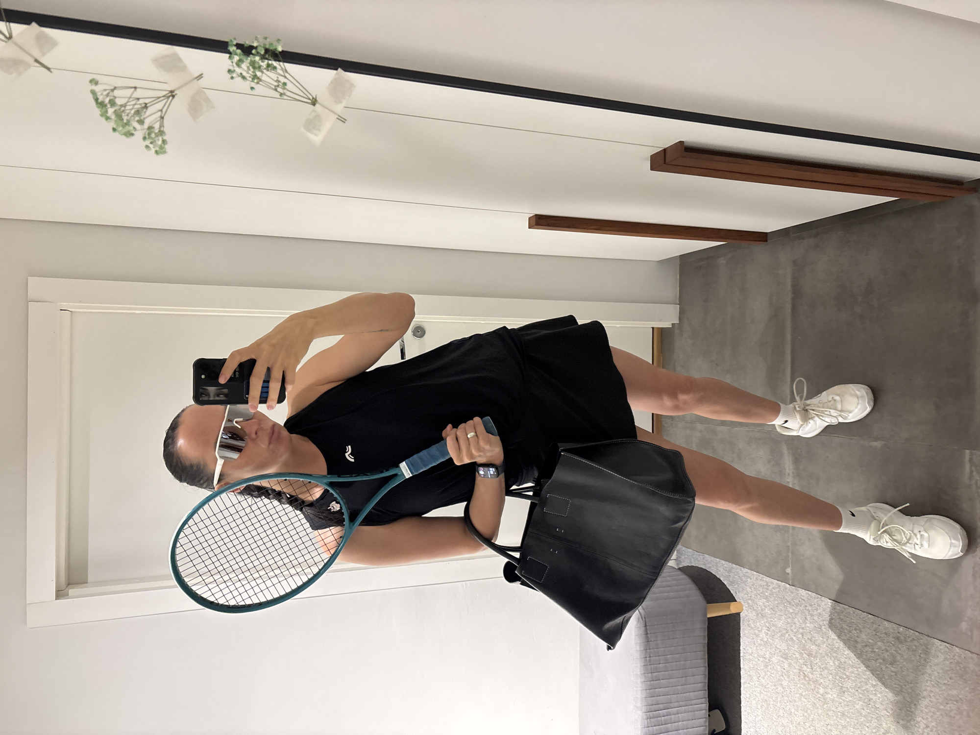 Early morning tennis session documented through selfies in Chaikovsky