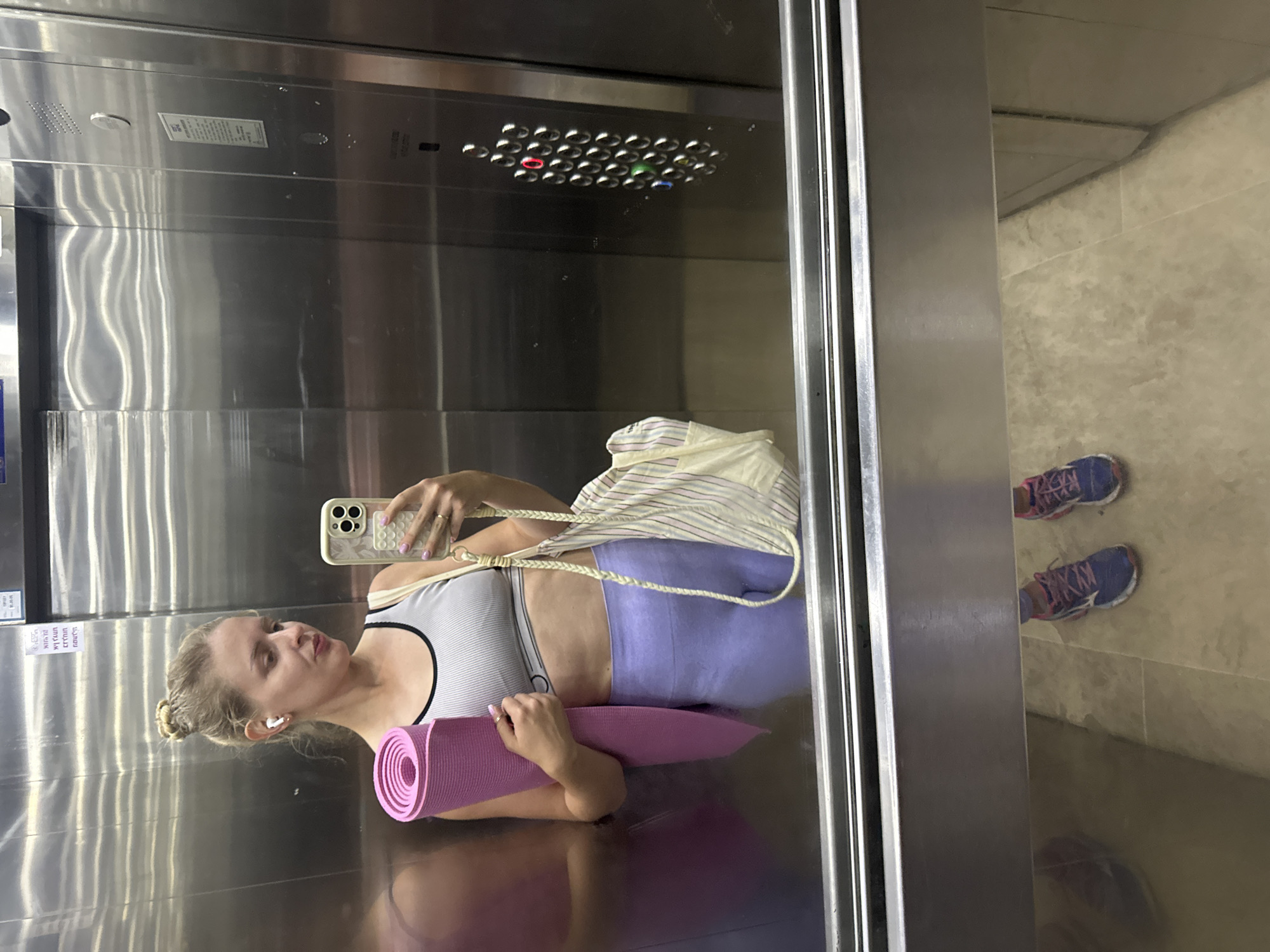Gym arrival in Petah Tikva, yoga mat in tow