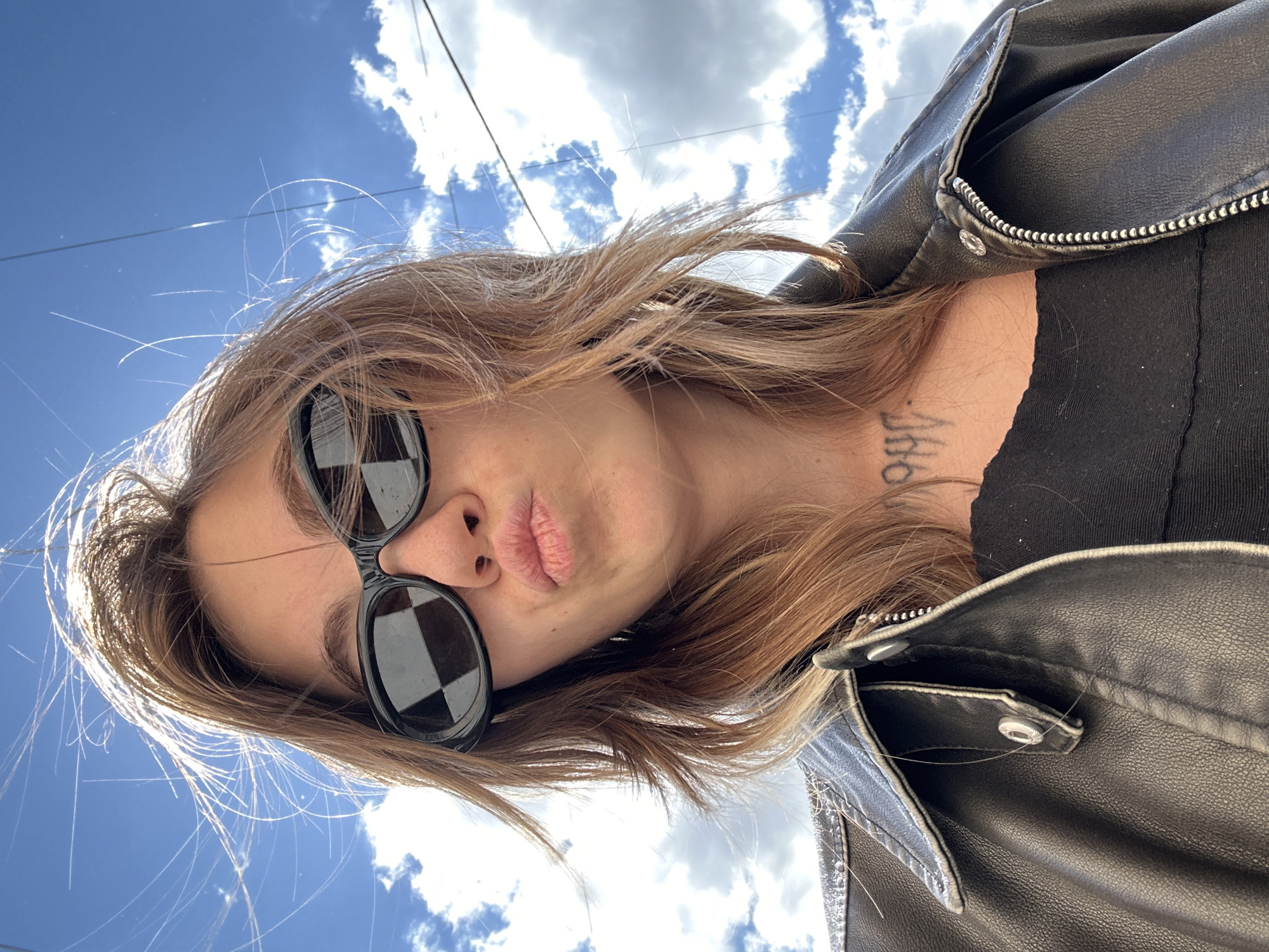 Selfie session in Moscow under a bright summer sky