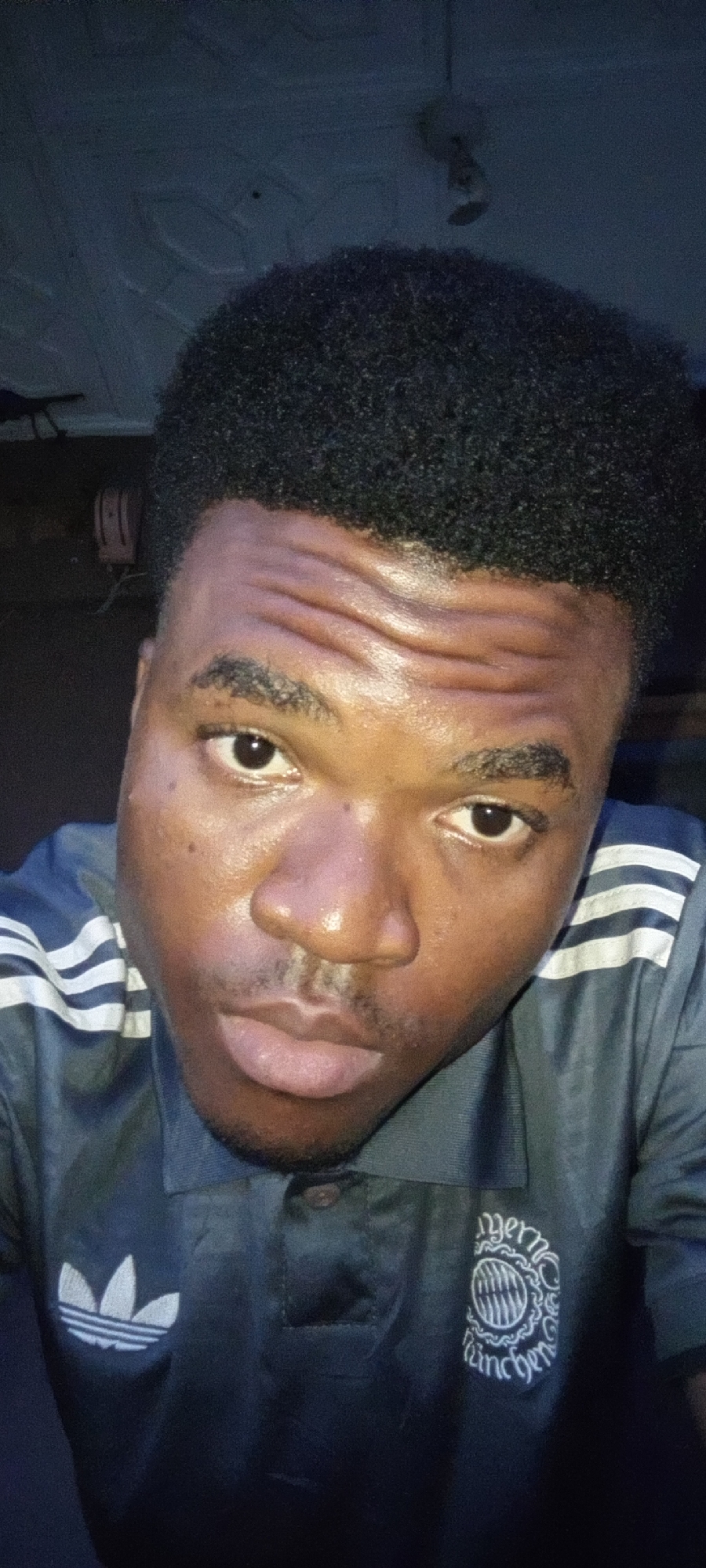 Young man takes selfie in Ilogbo Eremi, Nigeria