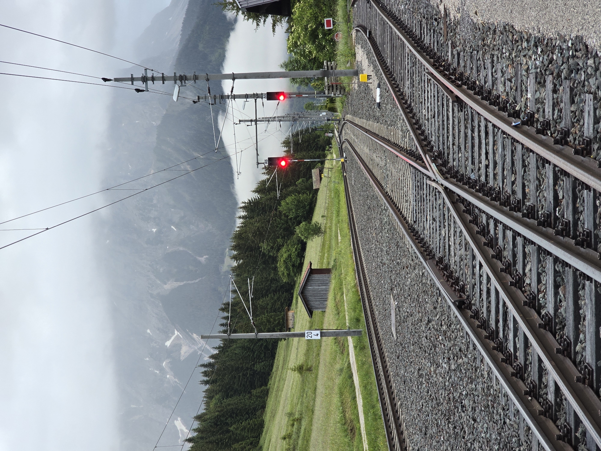 Observer Documents Railway Infrastructure in Alpine Village Lermoos