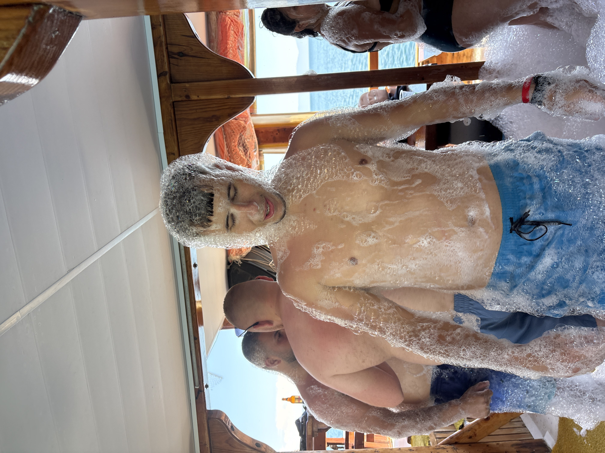 Foam party aboard boat in Menderes, Turkey draws young revelers