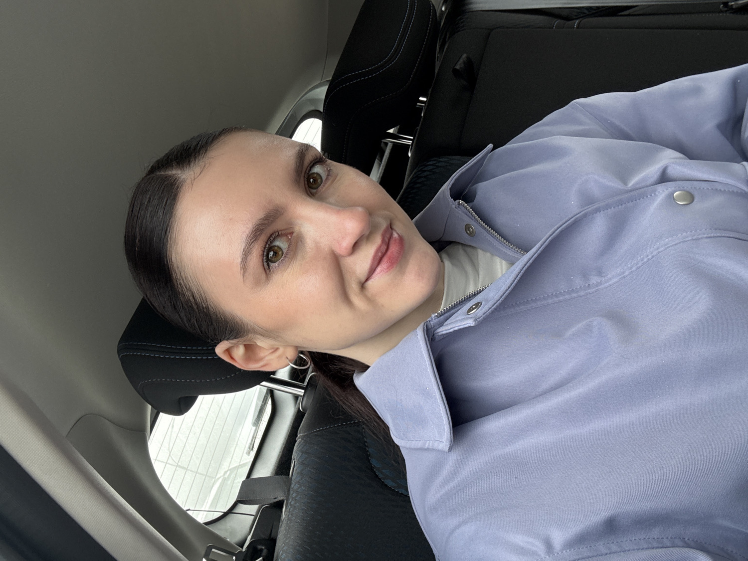 Woman takes car selfies in Kazan, Russia