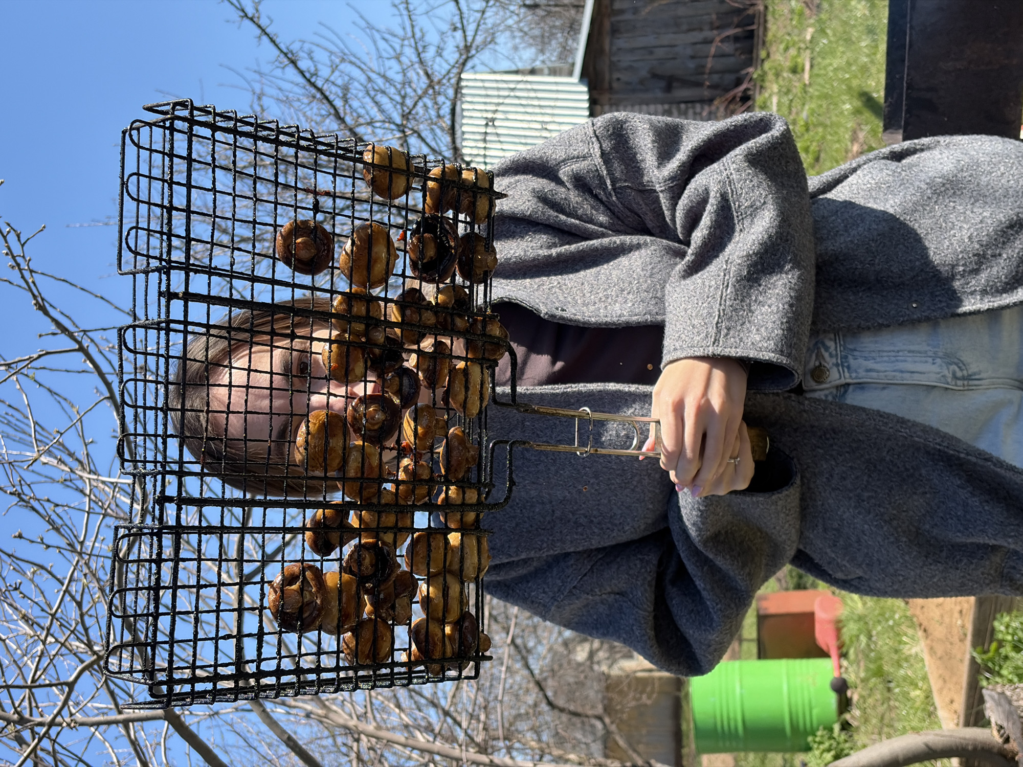 Morning barbecue gathering documented in Neftekamsk, Russia backyard