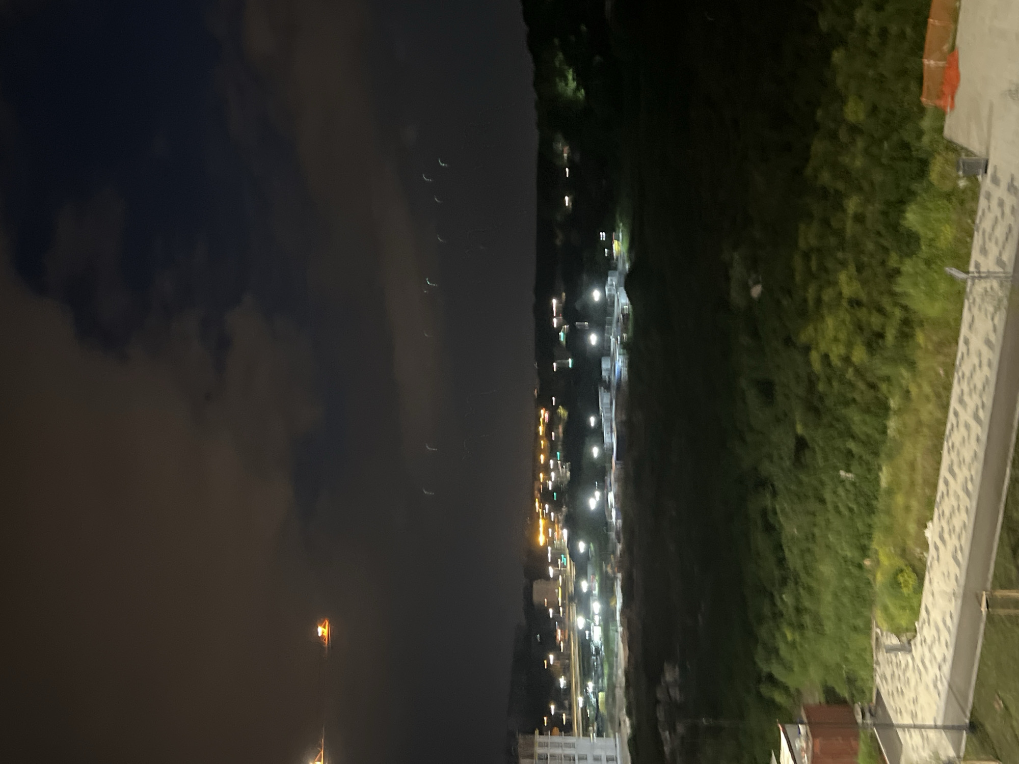 Nighttime views over a Yekaterinburg construction site and city streets