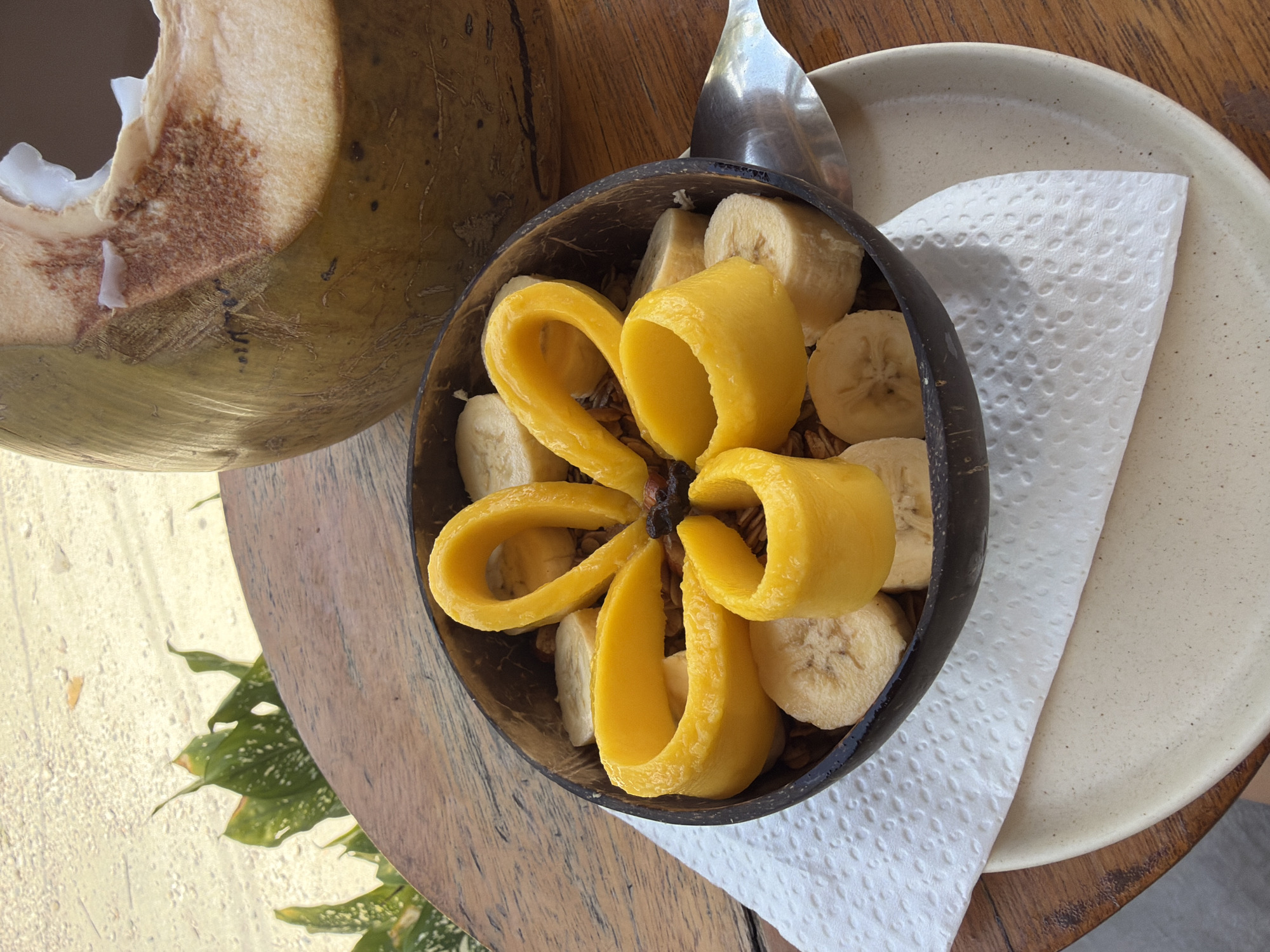 Early morning breakfast captured at wooden table in General Luna