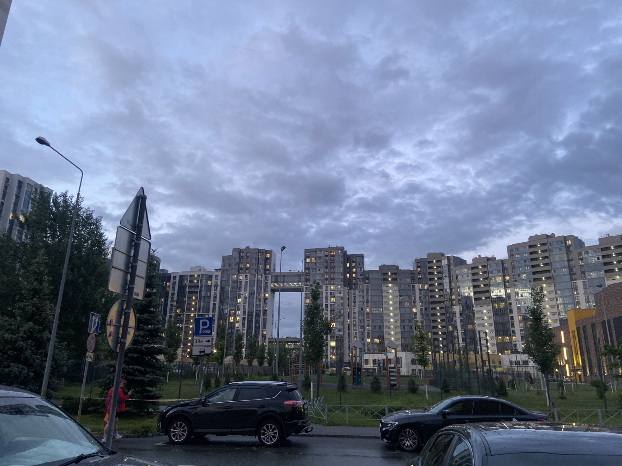 Urban scenes documented during evening hours after rainfall