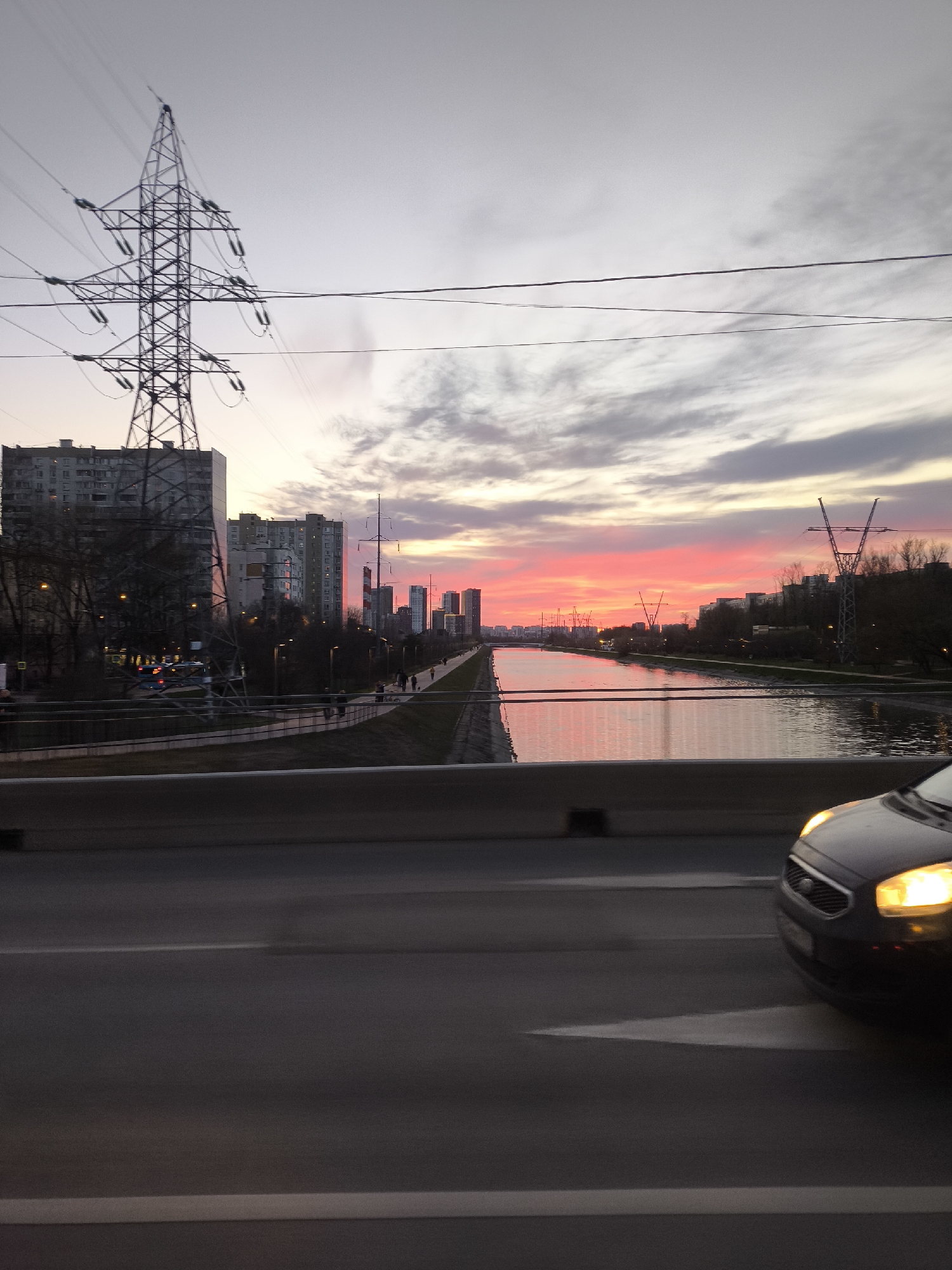 Traffic observed from moving vehicle on Moscow canal bridge