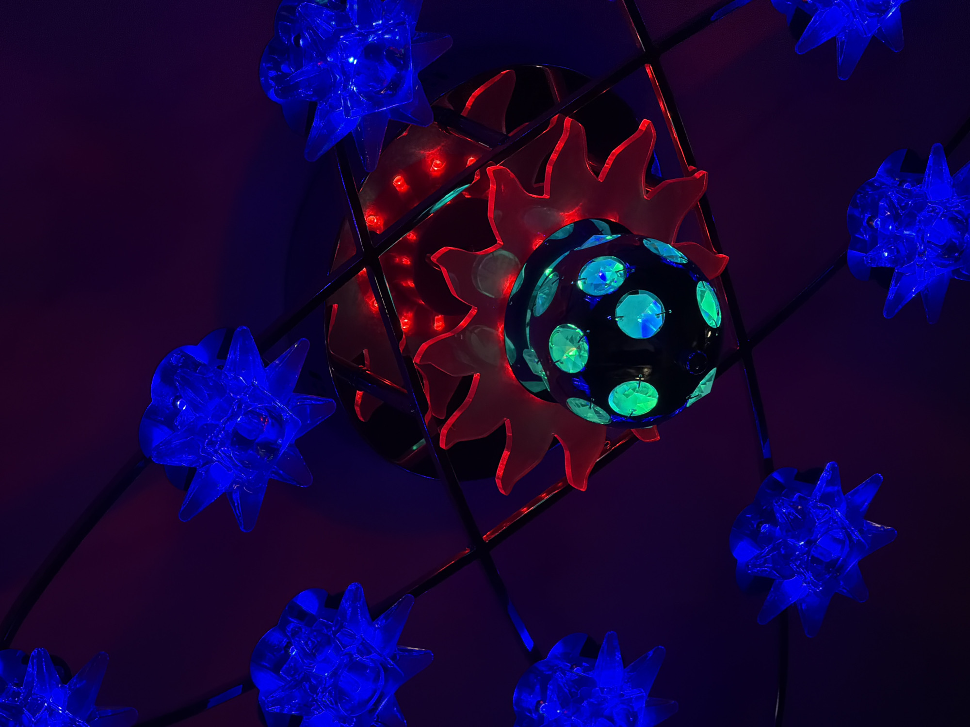 Blue star-shaped decorative lights observed in Perm indoor display