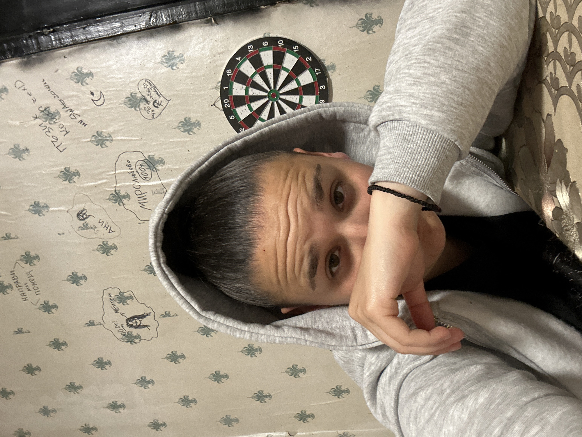Person in grey hoodie photographed indoors in Plovdiv