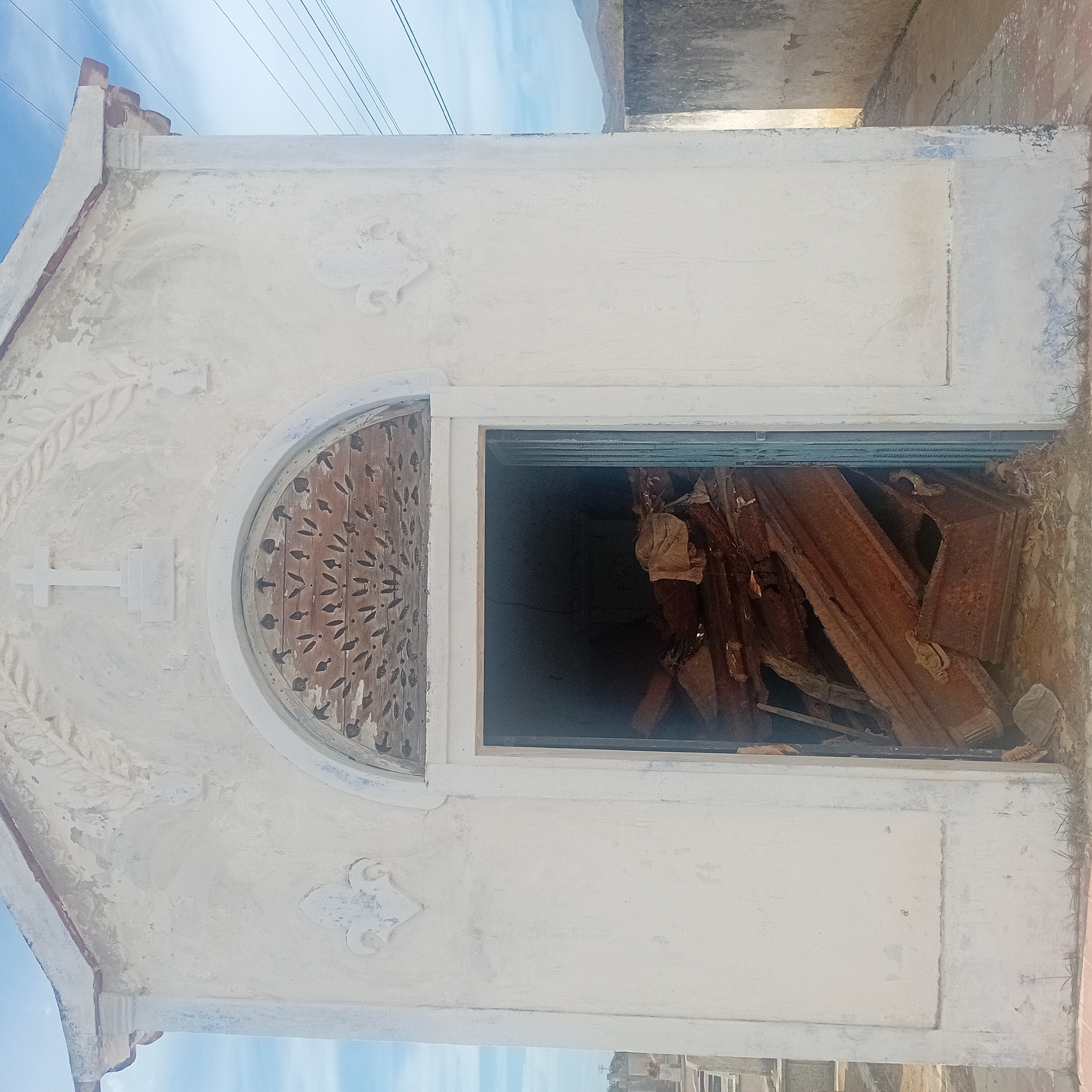 Witness documents cemetery scenes including damaged mausoleum, religious statuary