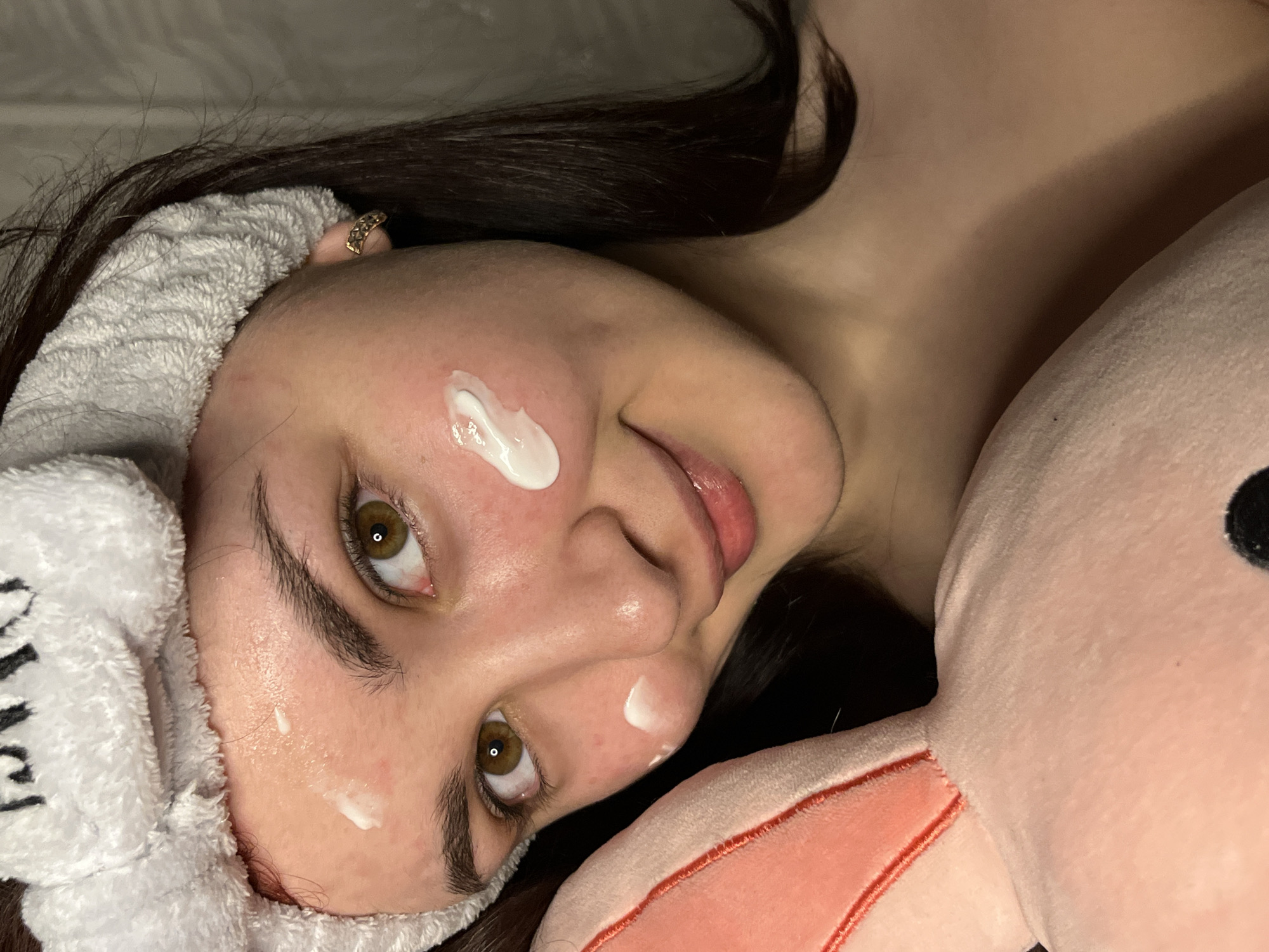 Woman documents beauty routine with flowers in Neftekamsk