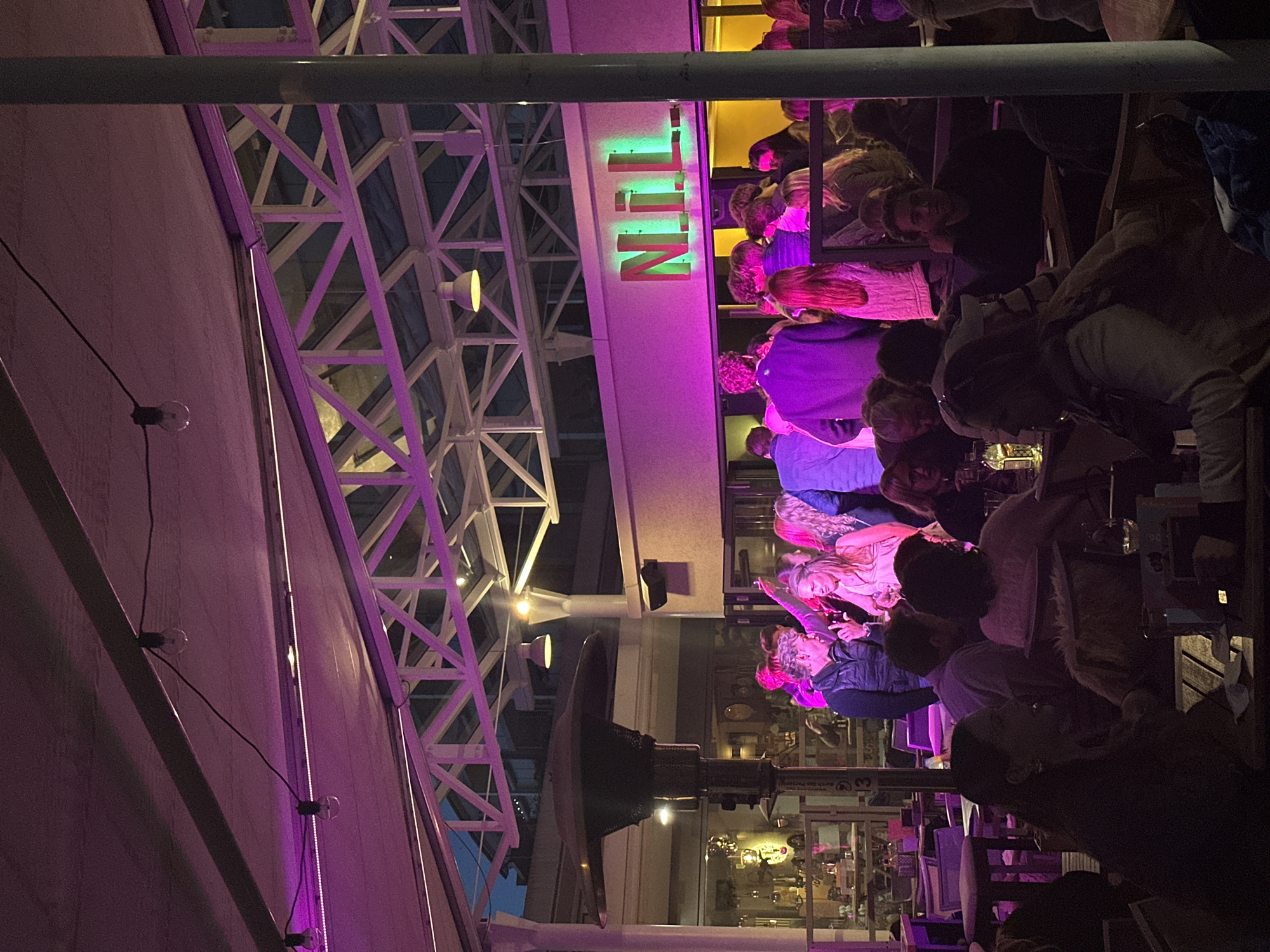 Evening crowd gathers at NFL-themed outdoor venue in Kiel