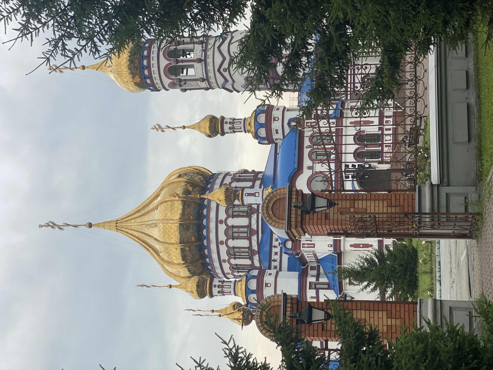 Novokuznetsk's Transfiguration Cathedral and its grounds on a grey morning