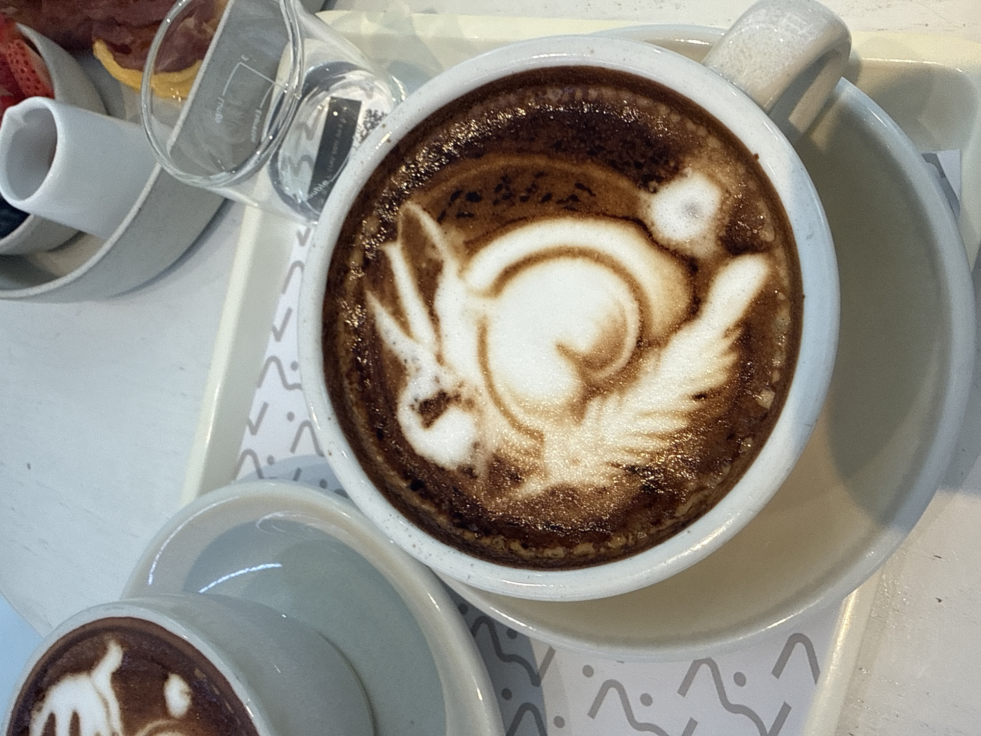 Breakfast and coffee at a Bangkok café, July 2026