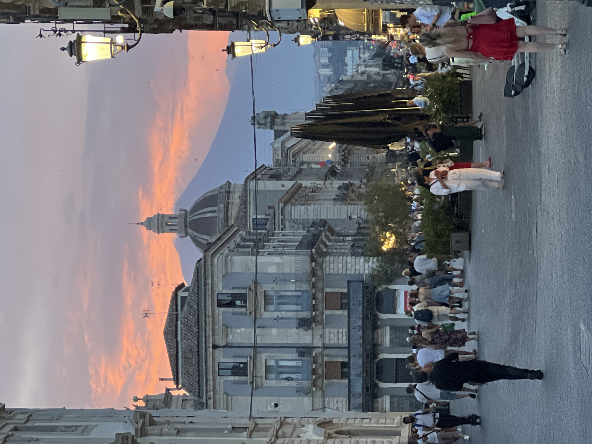 Catania's Baroque city center at dusk, Etna on the horizon