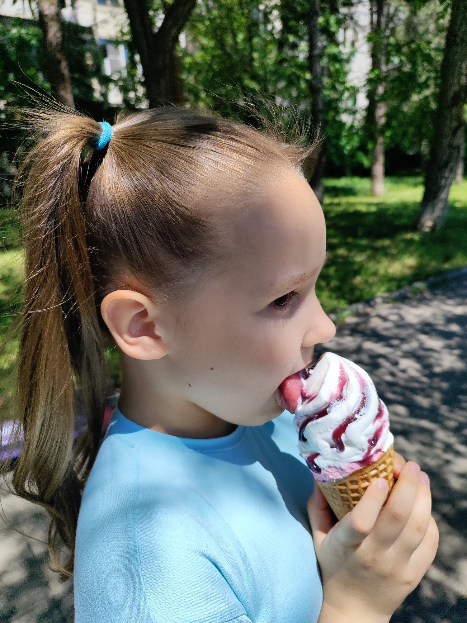 Child enjoys ice cream, fountain play in Krasnodar park