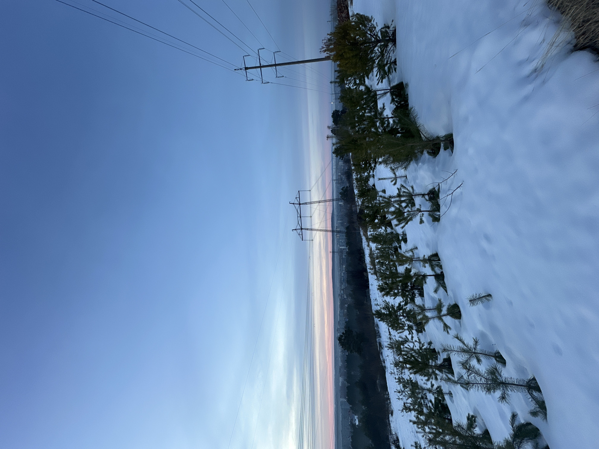 Winter scenes documented in Chaikovsky, Russia during dusk hours