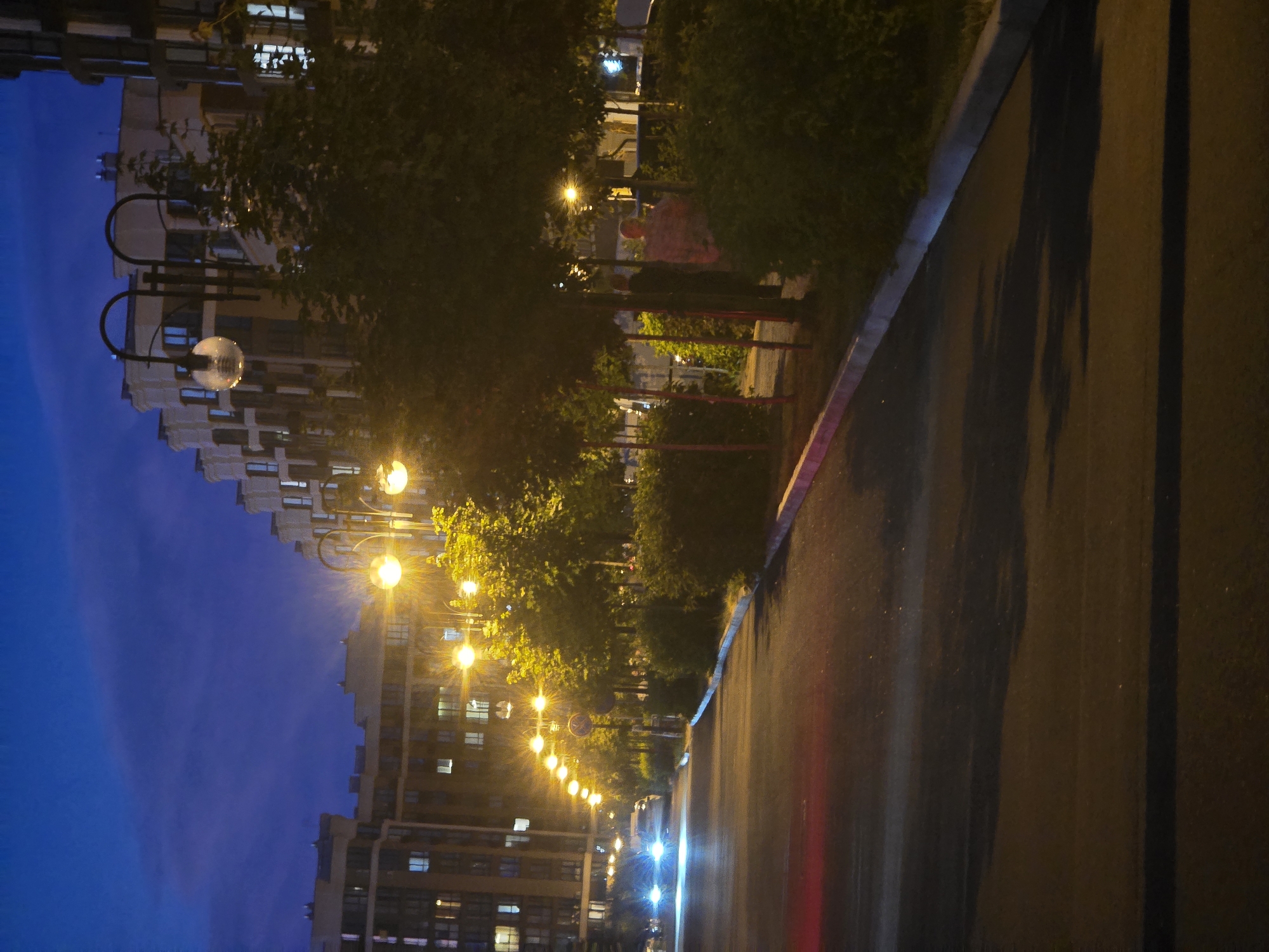 Summer evening walk through a lit-up Kyiv suburb