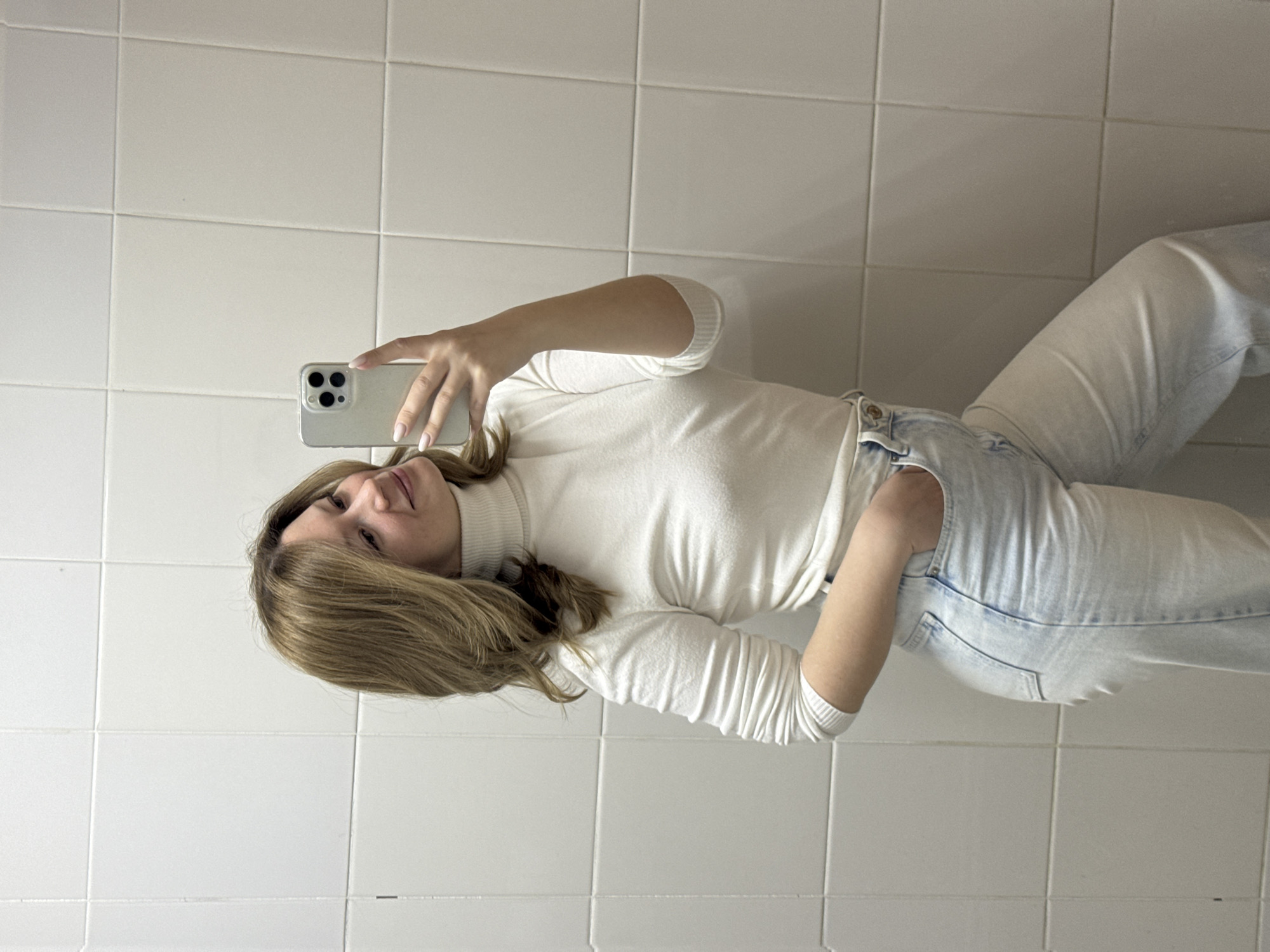 Woman takes selfies at beauty salon in Chaikovsky