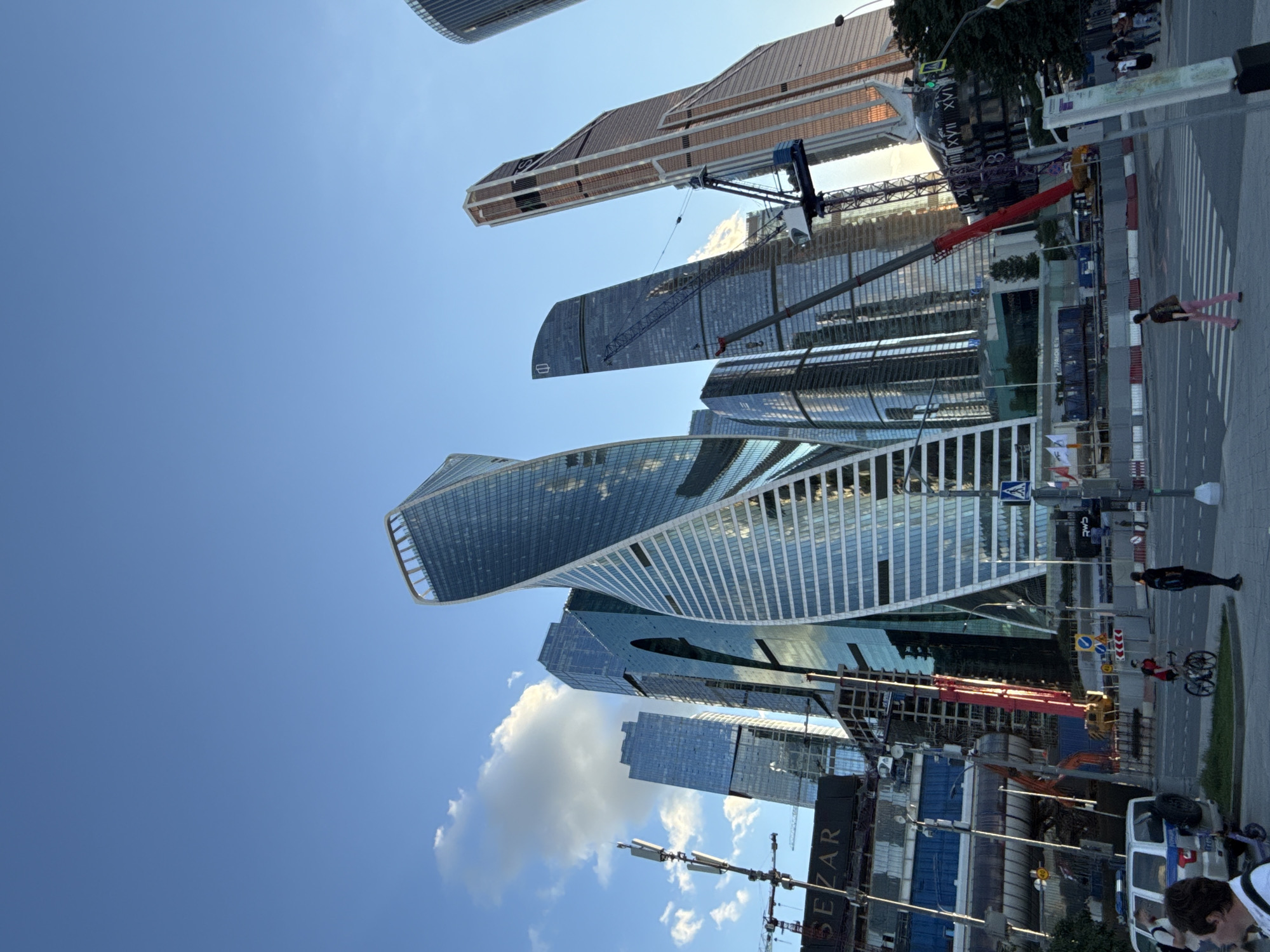Moscow City skyline along the river on a clear summer day