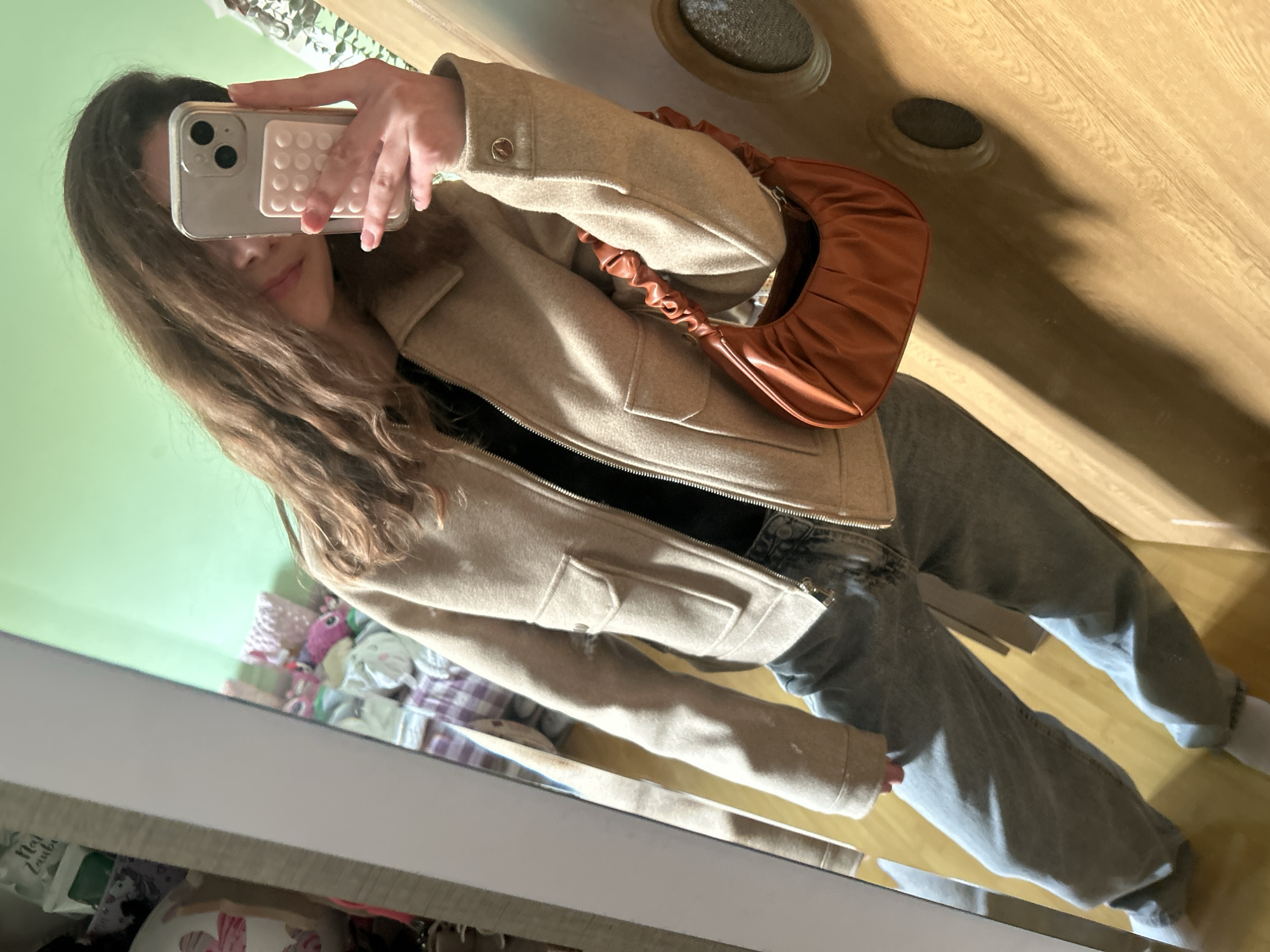 Woman takes mirror selfie in Ruse, Bulgaria