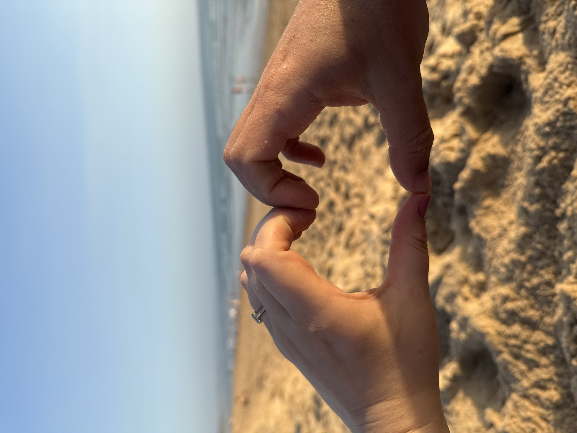 Wedding celebration at Costa da Caparica beach during golden sunset