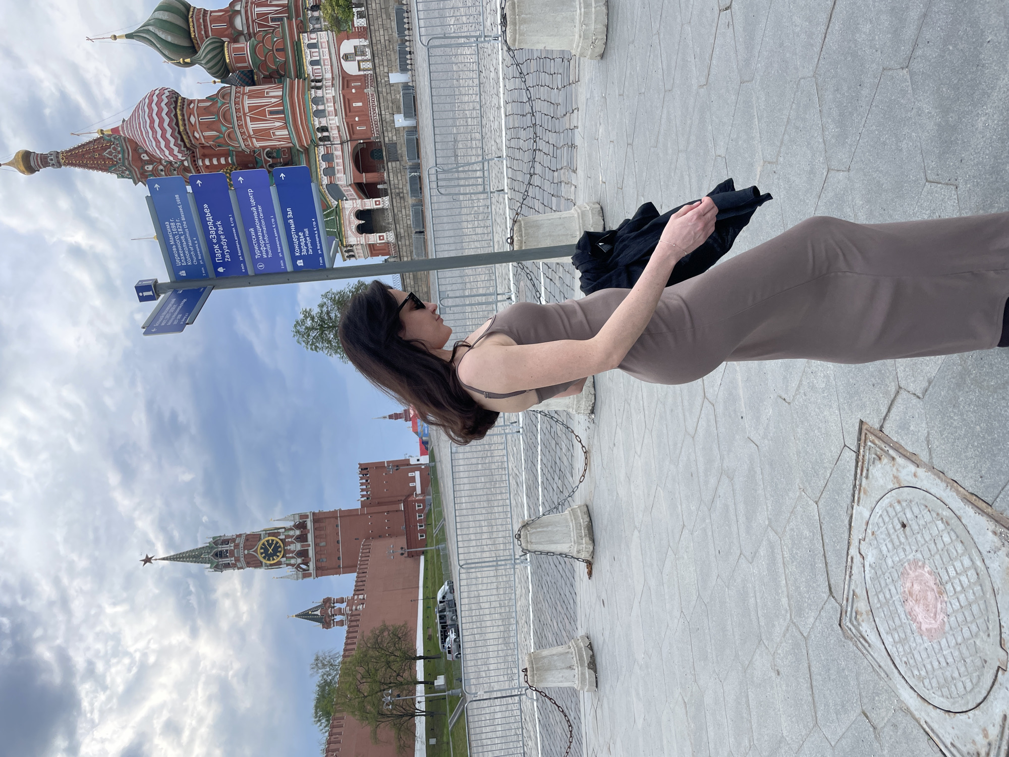 Woman visits Red Square amid Moscow landmarks