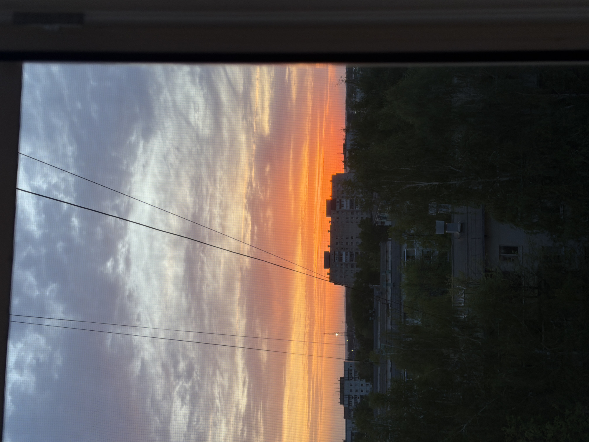 Sunset sequence documented over Chaikovsky, Russia cityscape
