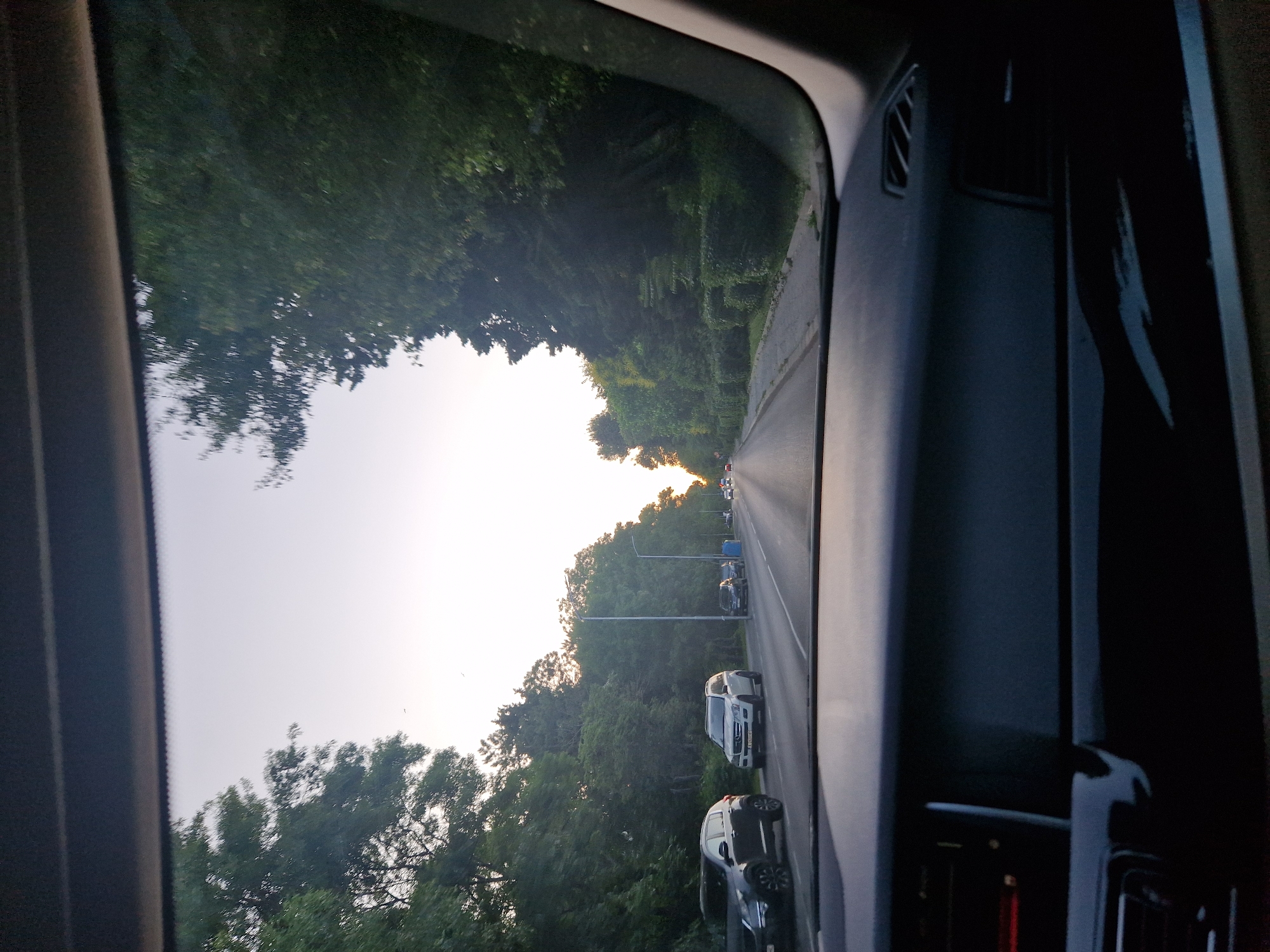 Afternoon drive through Sofia streets, city views from inside a car