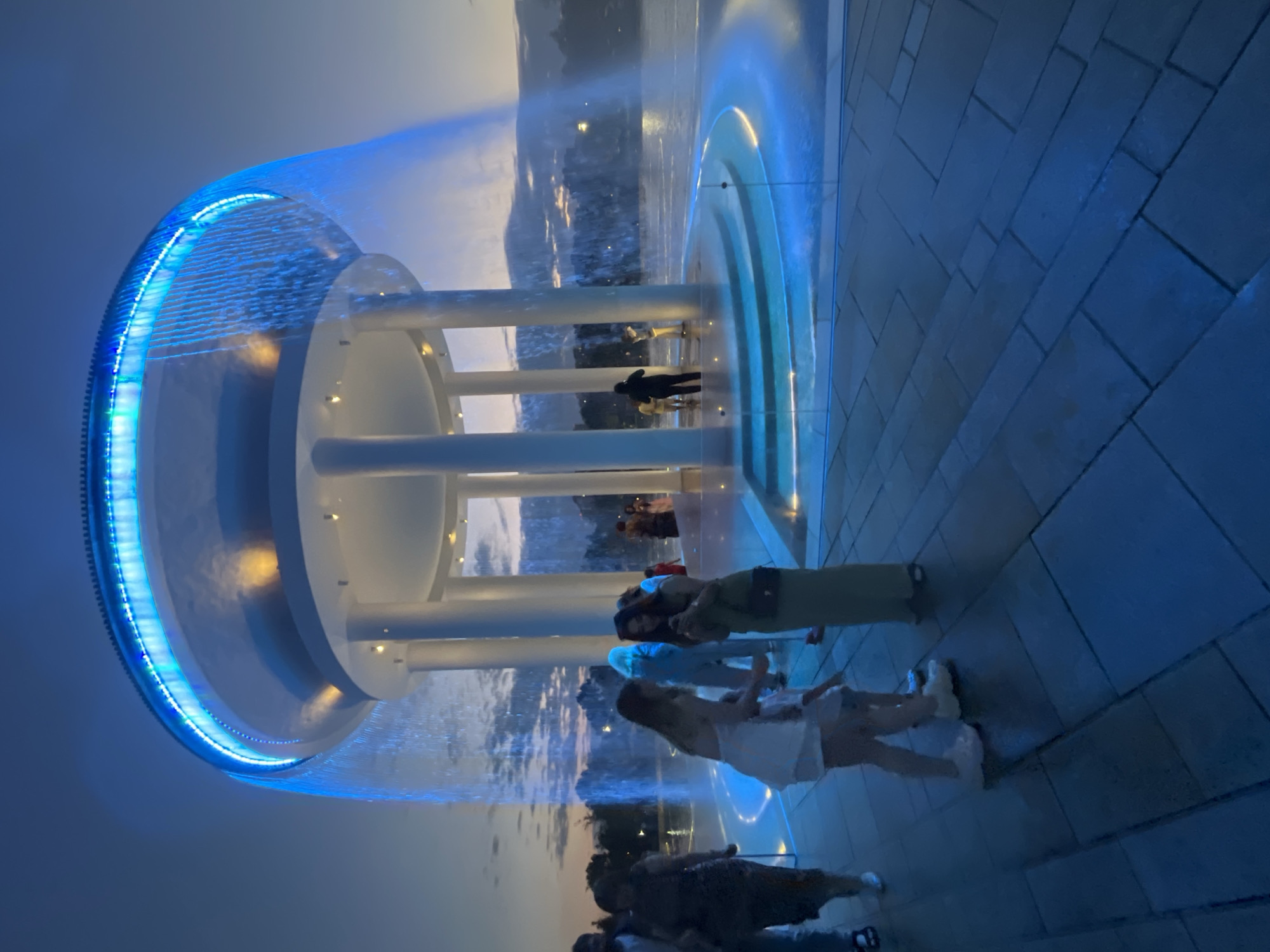 Krasnodar's illuminated fountain complex draws an evening crowd