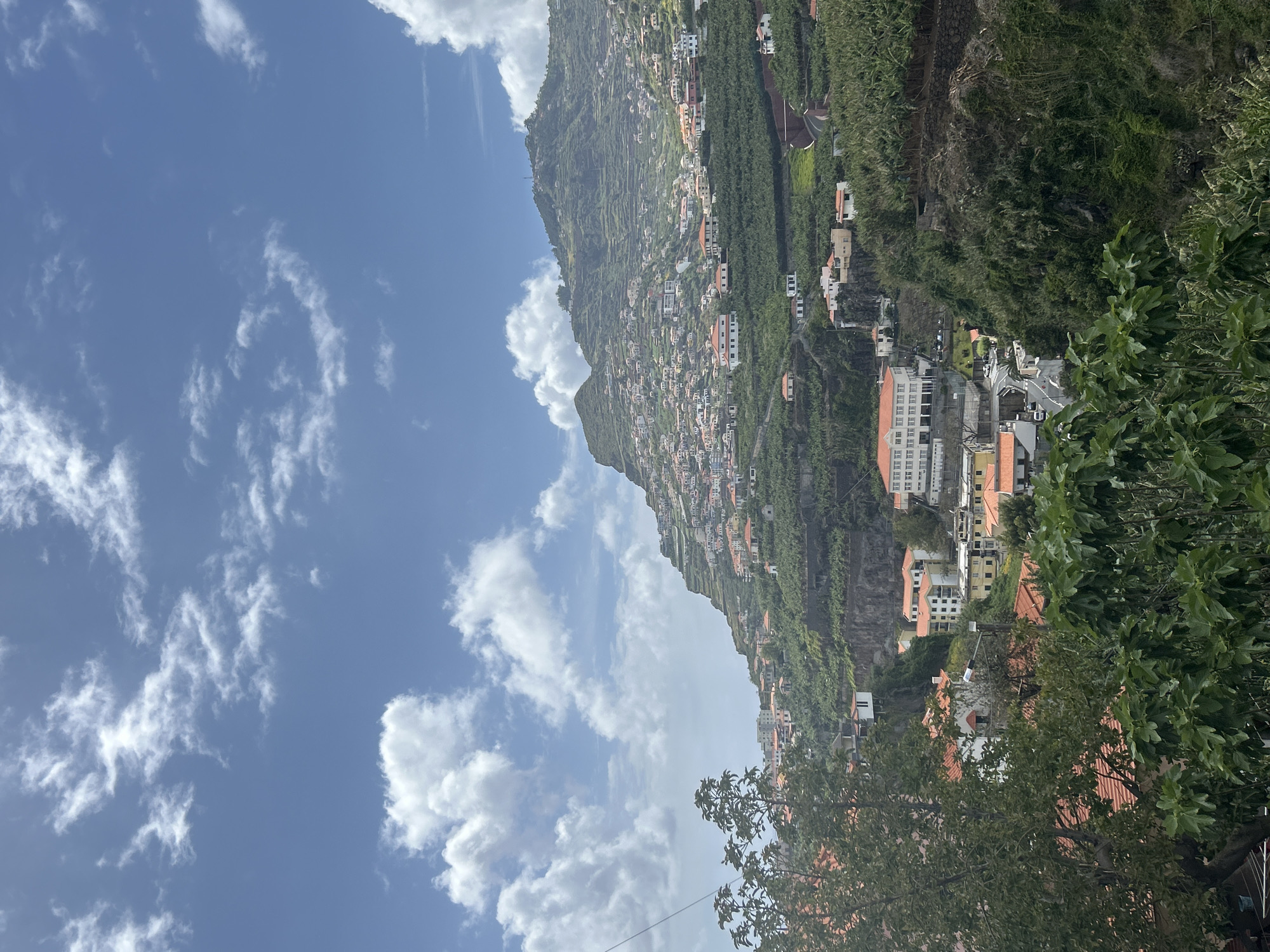 Tourist documents afternoon scenes in Portuguese hillside town