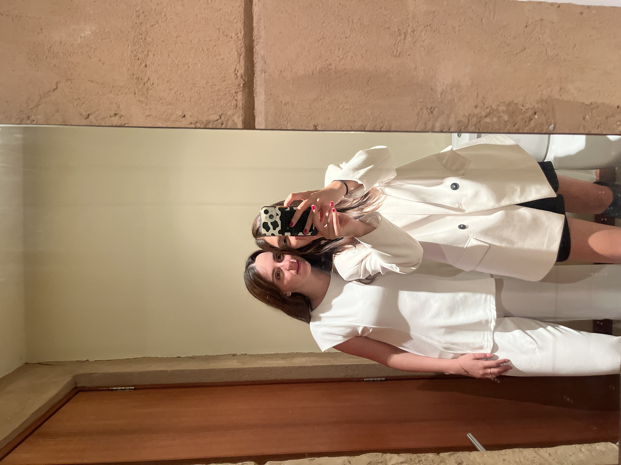 Women take bathroom selfies in San Bernardino Tlaxcalancingo