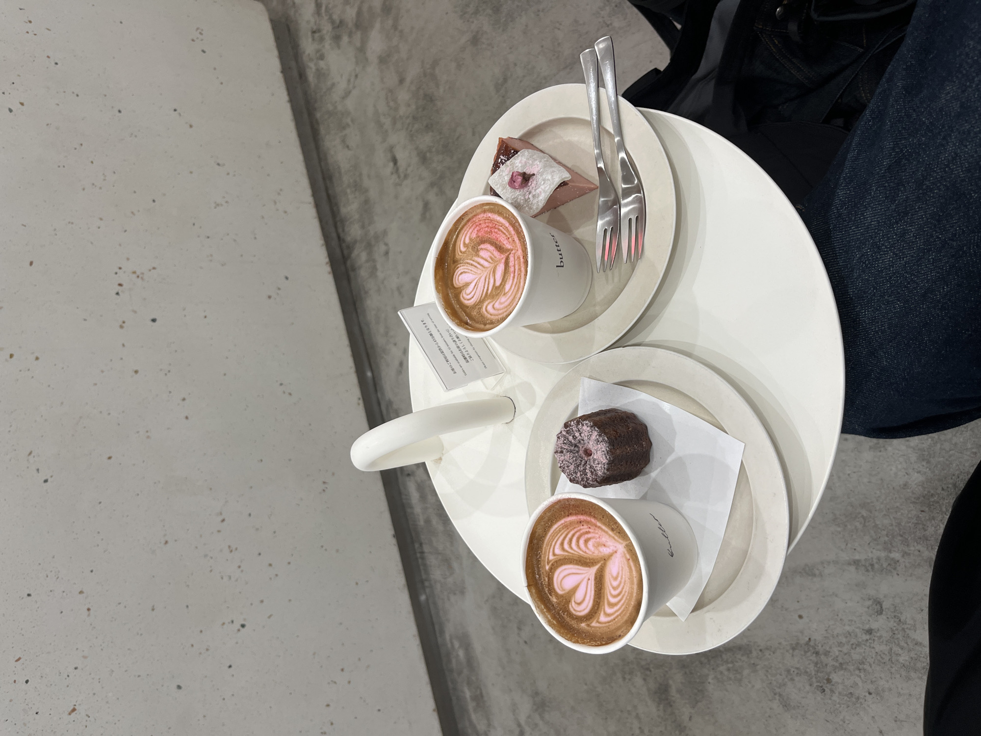 Pink latte art served with desserts in Nakano