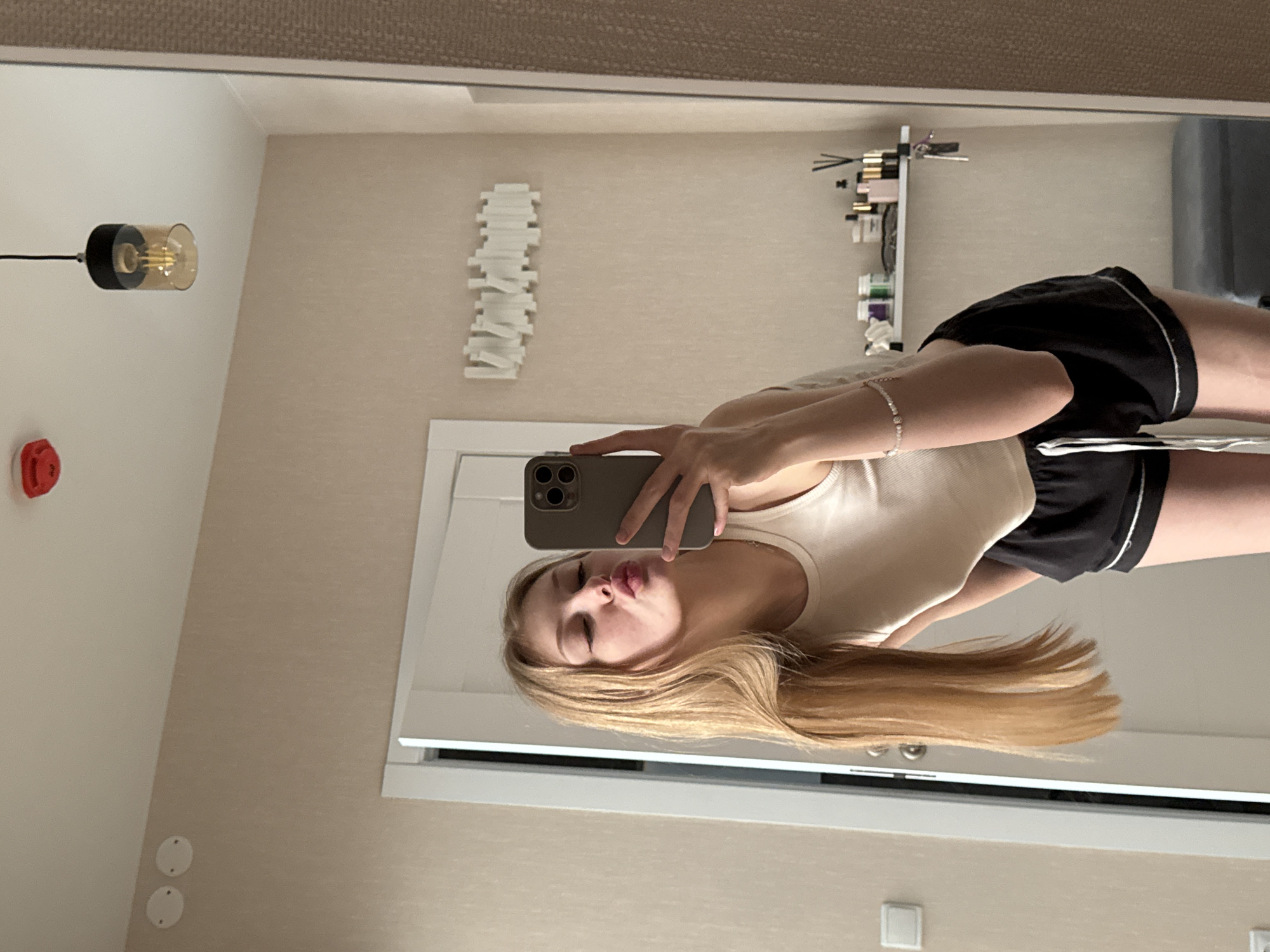 Woman takes morning selfies in Perm apartment