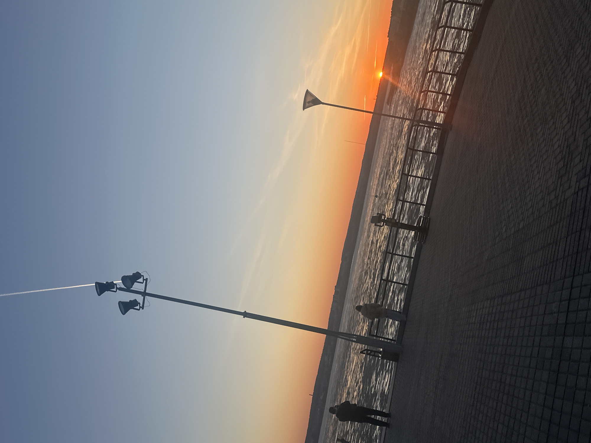 Sunset captured over Izhevsk pond waterfront, Russia