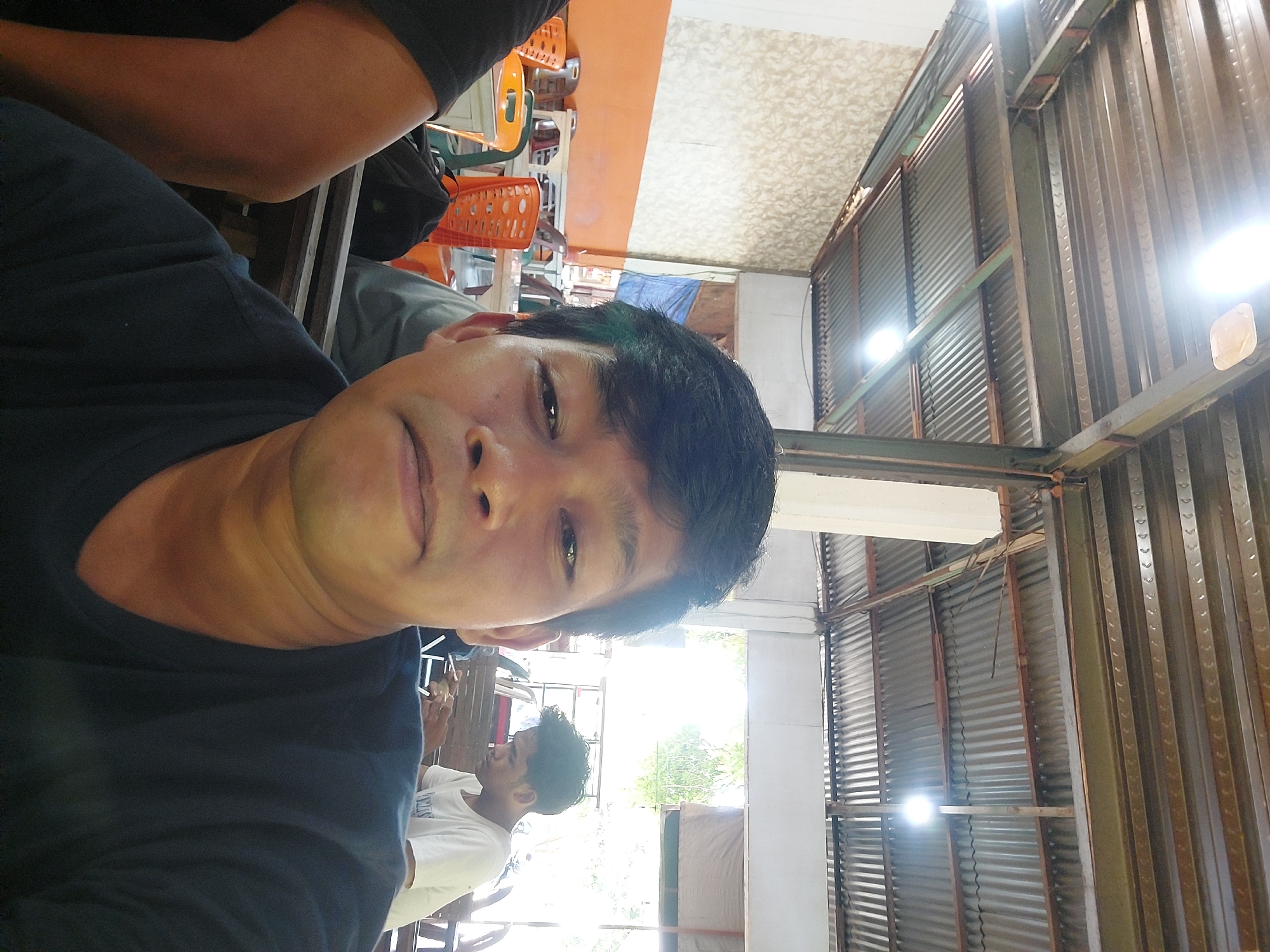 Casual hangout under a corrugated metal roof