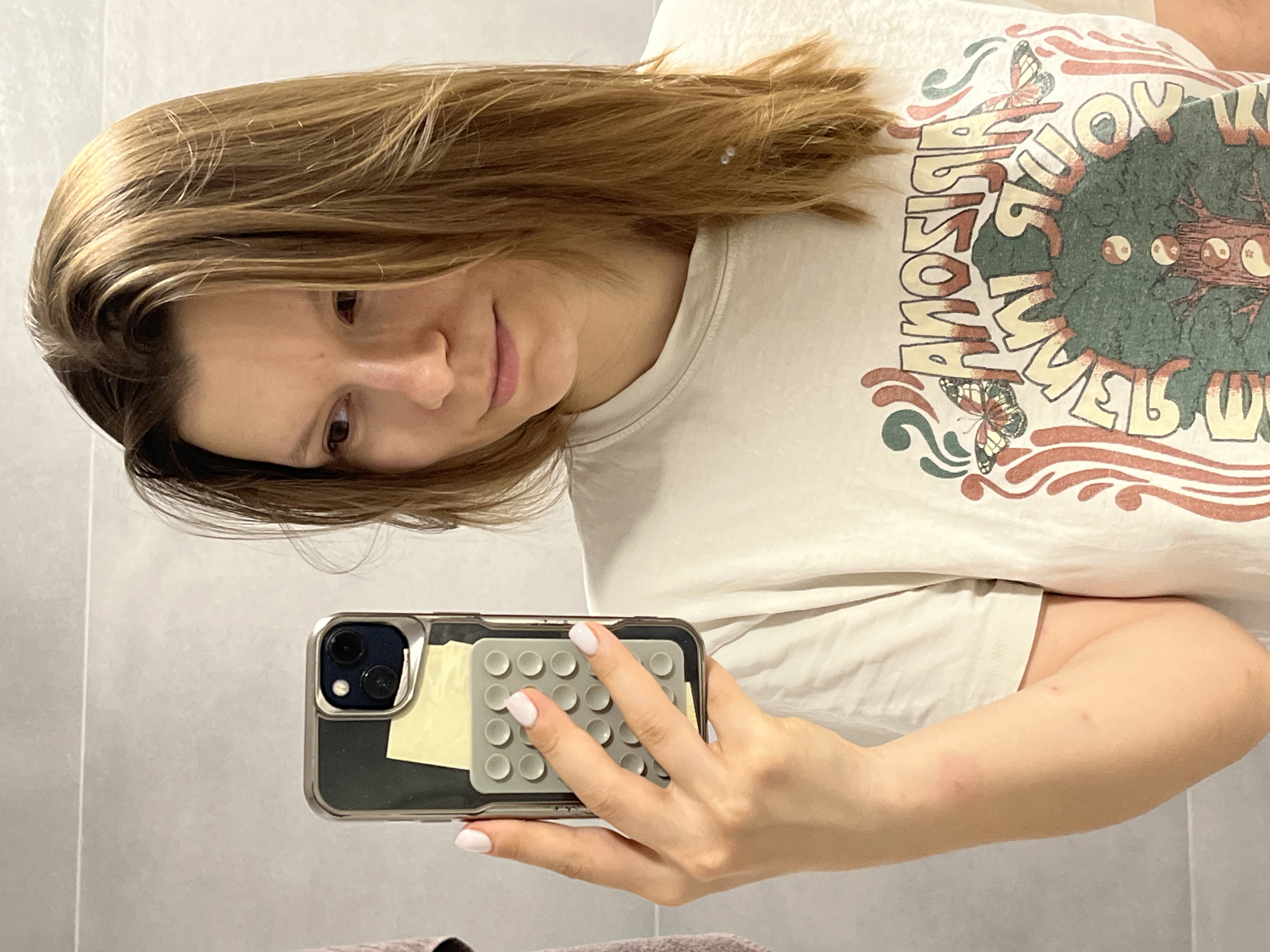 Woman documents evening skincare routine in Limassol bathroom