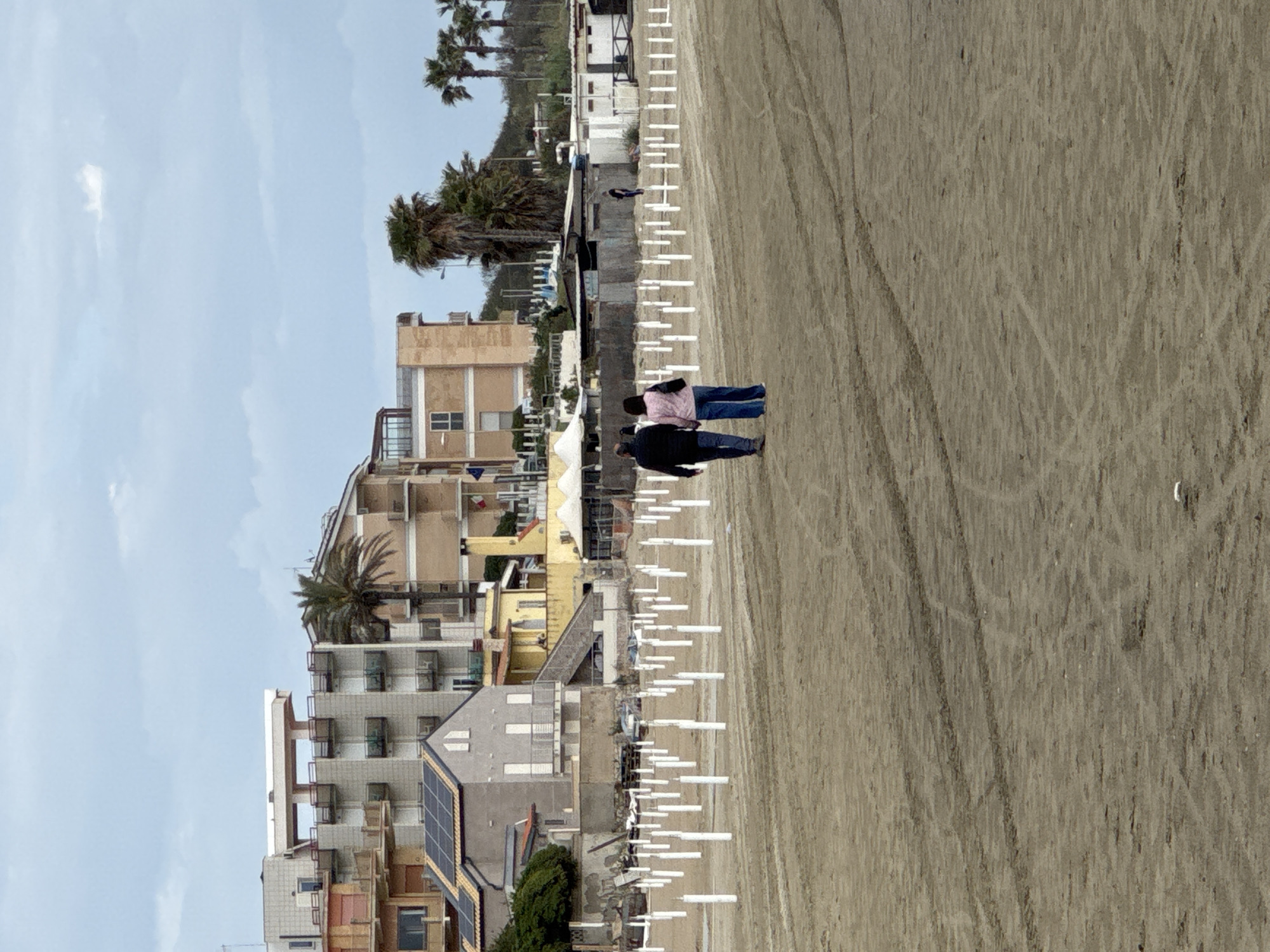 Afternoon beach life documented in Nettuno, Italy