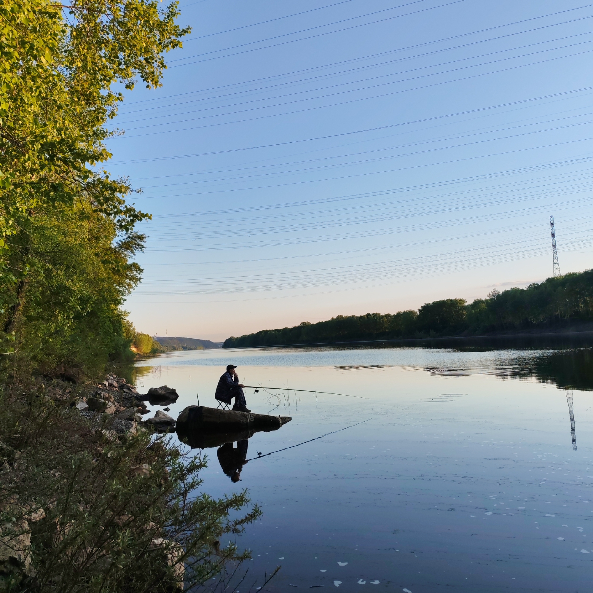 Quiet riverside moments documented in Chaikovsky, Russia