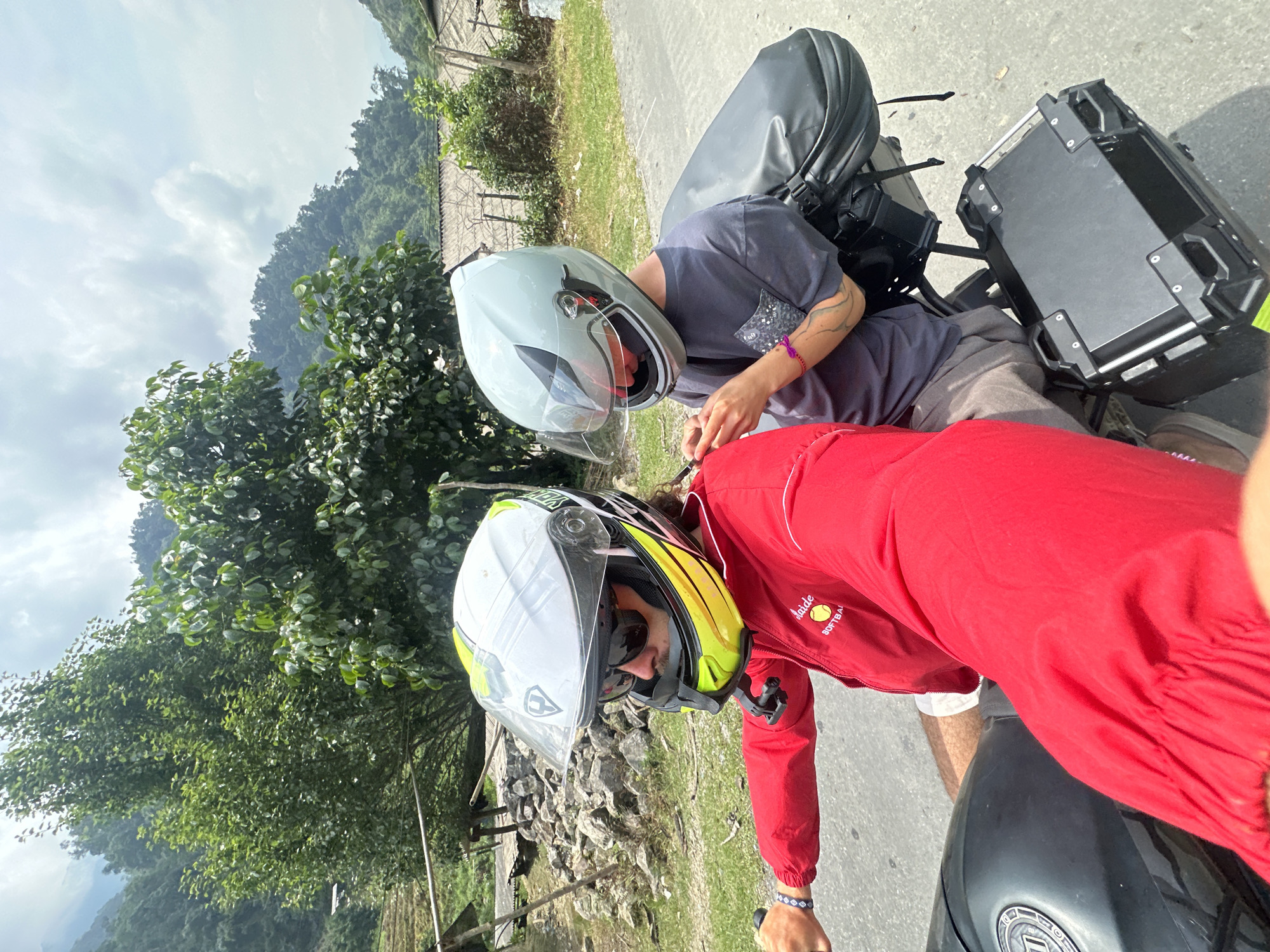 Morning motorcycle journey documented on rural Vietnamese mountain road