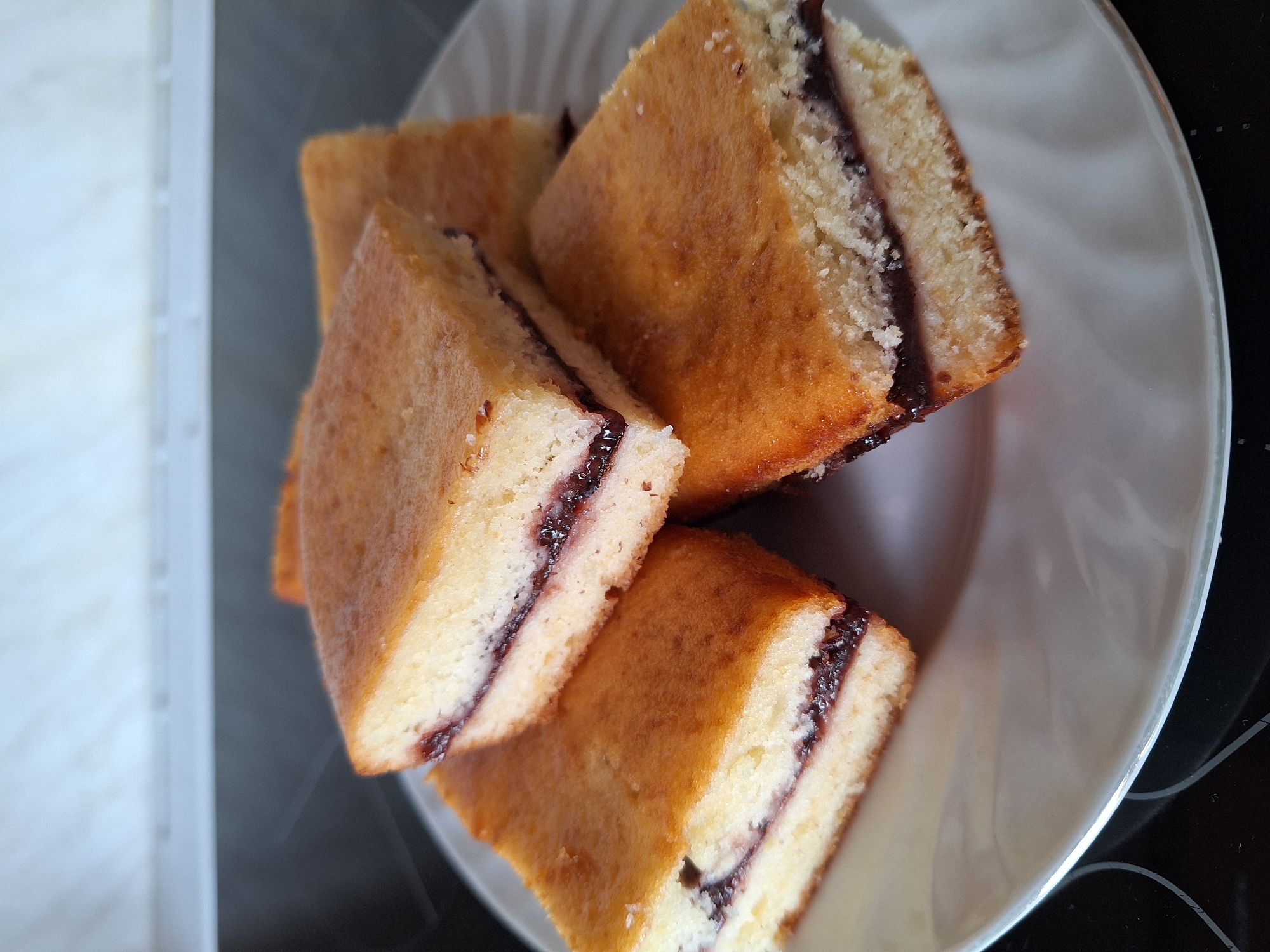 Morning cake and coffee breakfast documented in Montana, Bulgaria