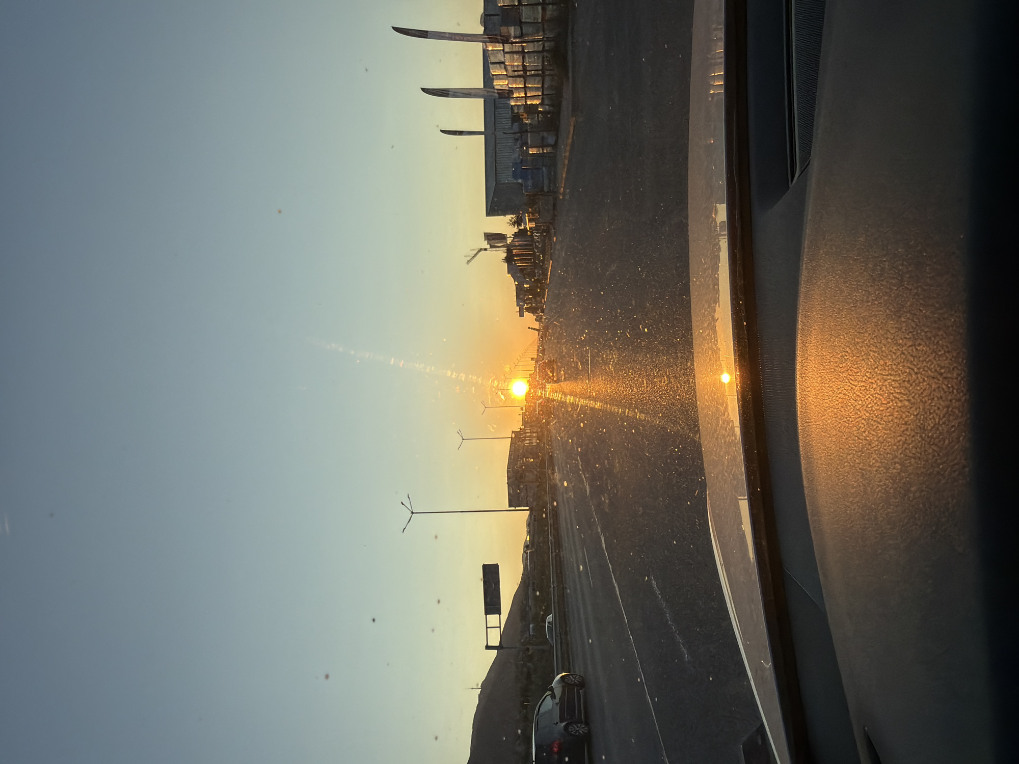 Golden hour sunset through a windshield in Sofia